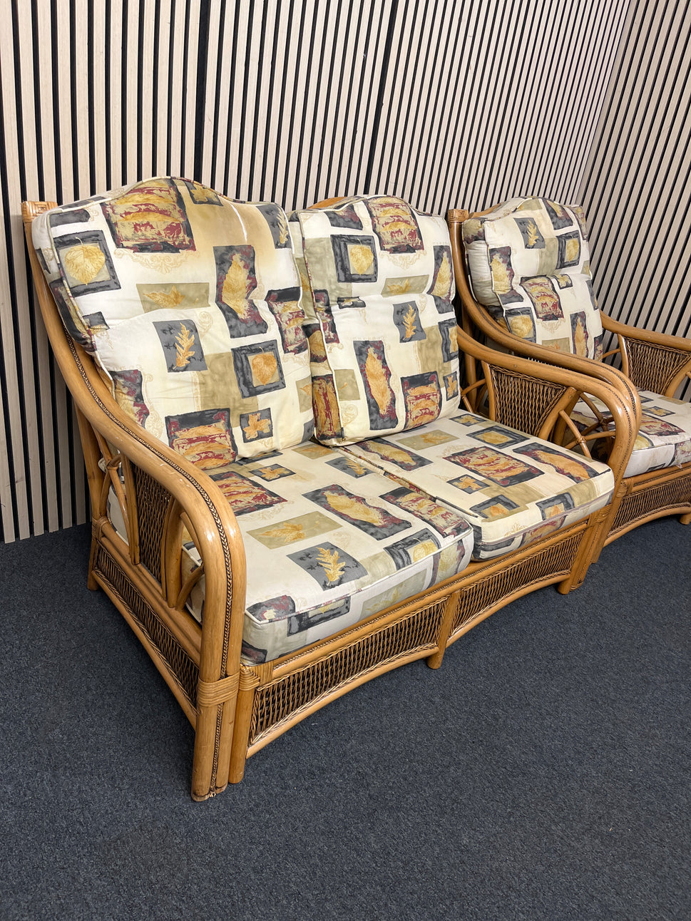 Bamboo-style wicker 2 seater sofa, armchair and matching glass-top side tables.  44379
