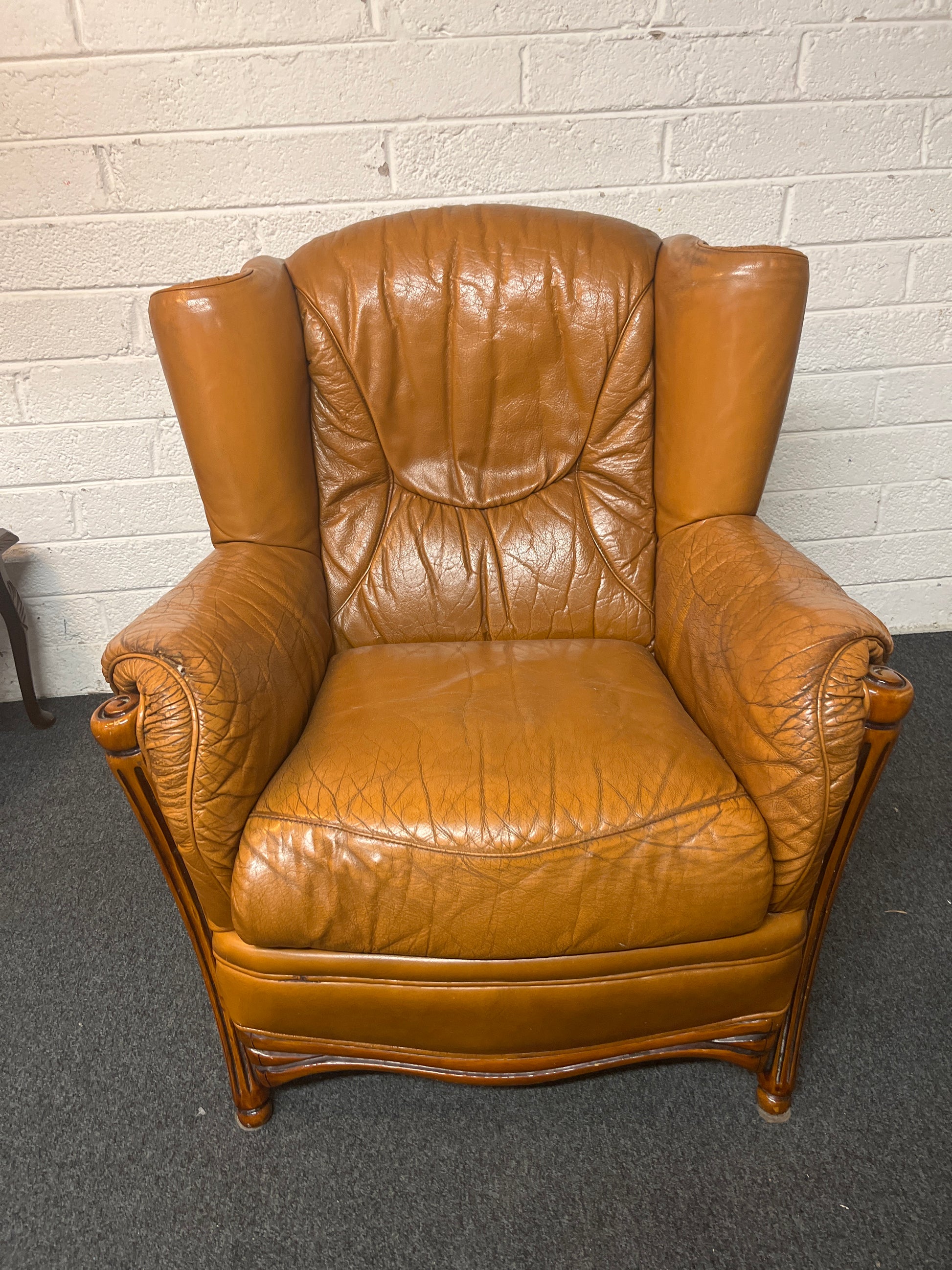 Real tan leather armchair with oak frame