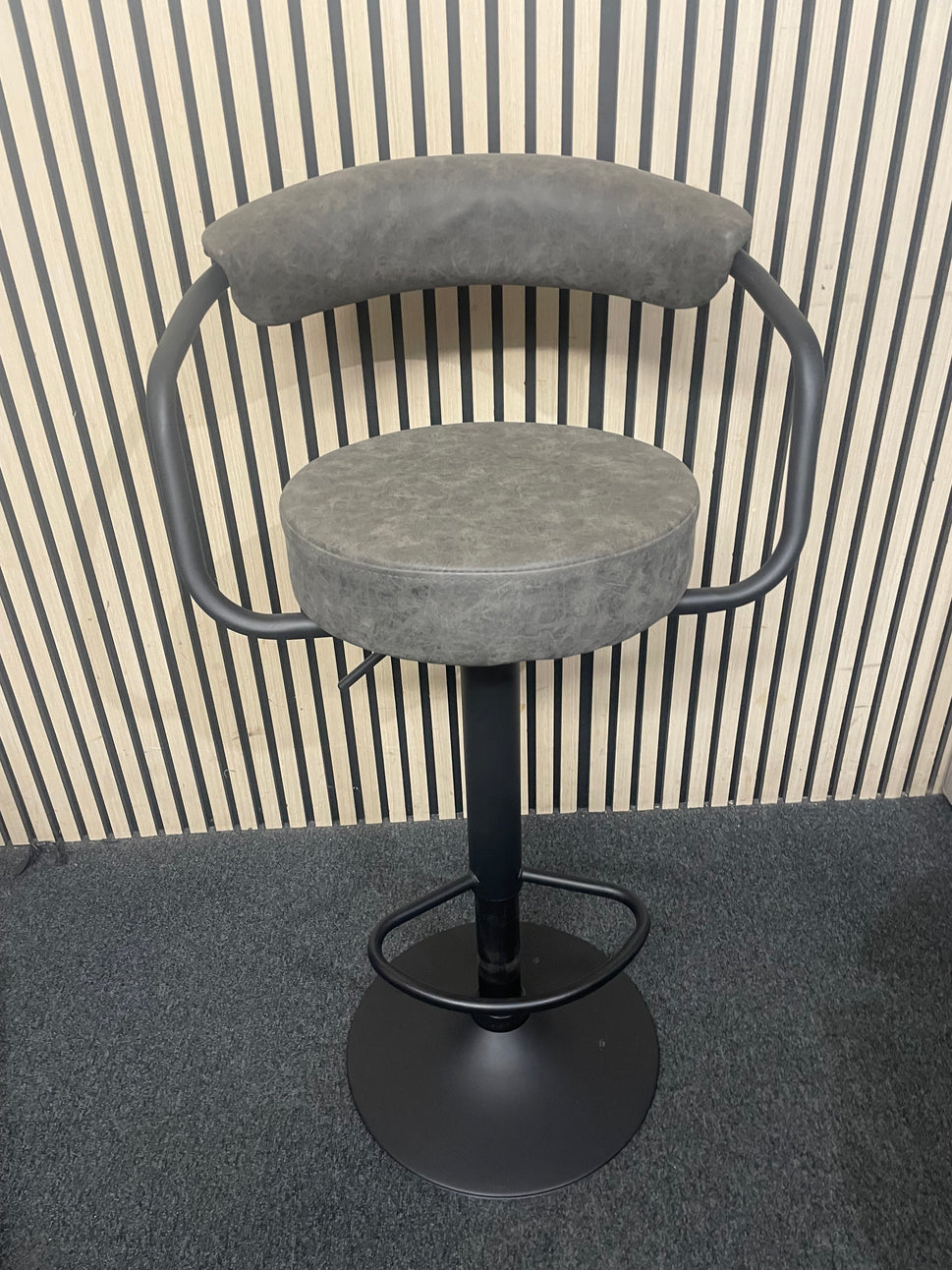 Black metal framed height adjustable swivel bar stool with back in grey fabric  44063