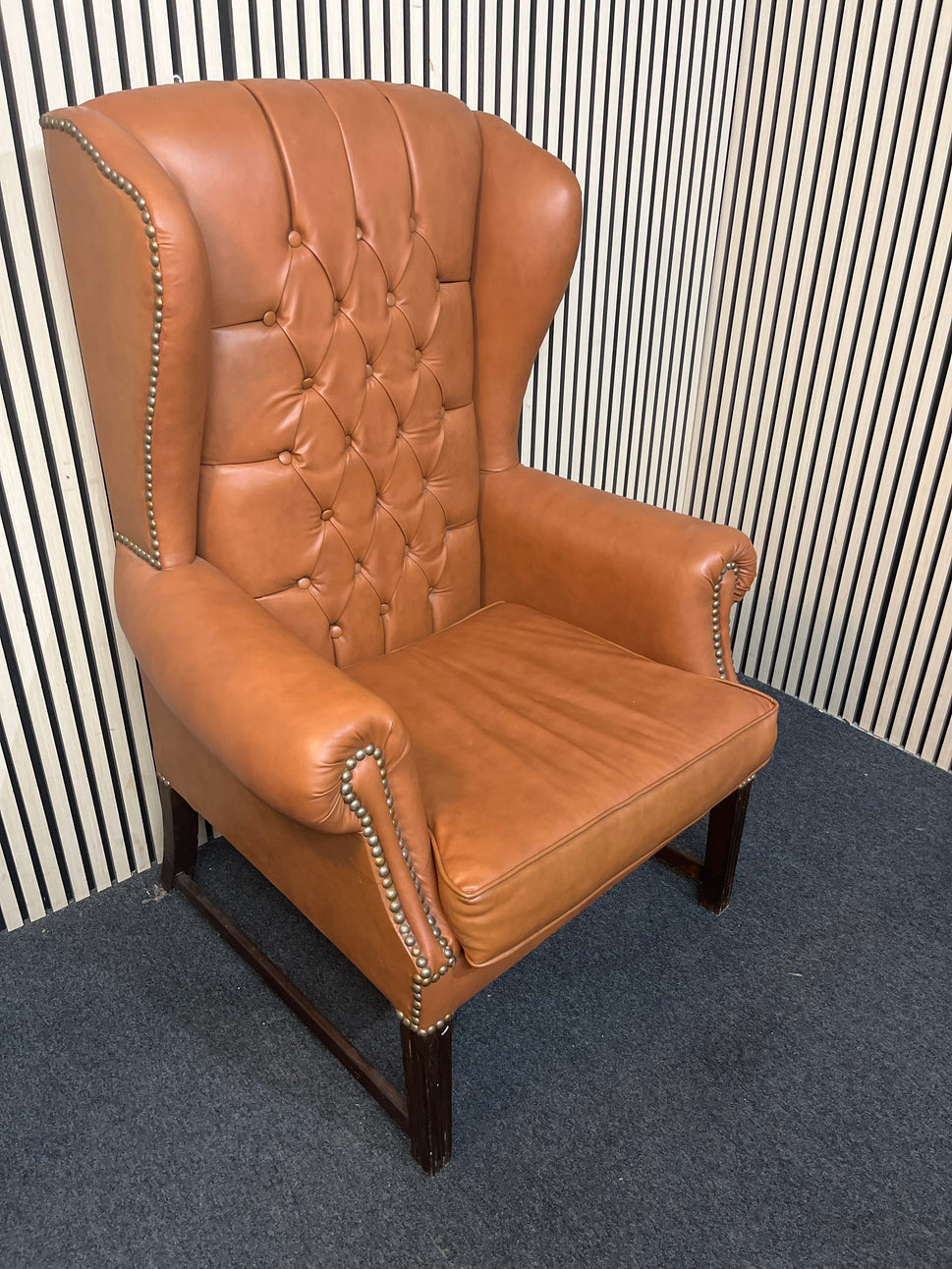 High back wing armchairs in tan leather with solid wood frame  43713