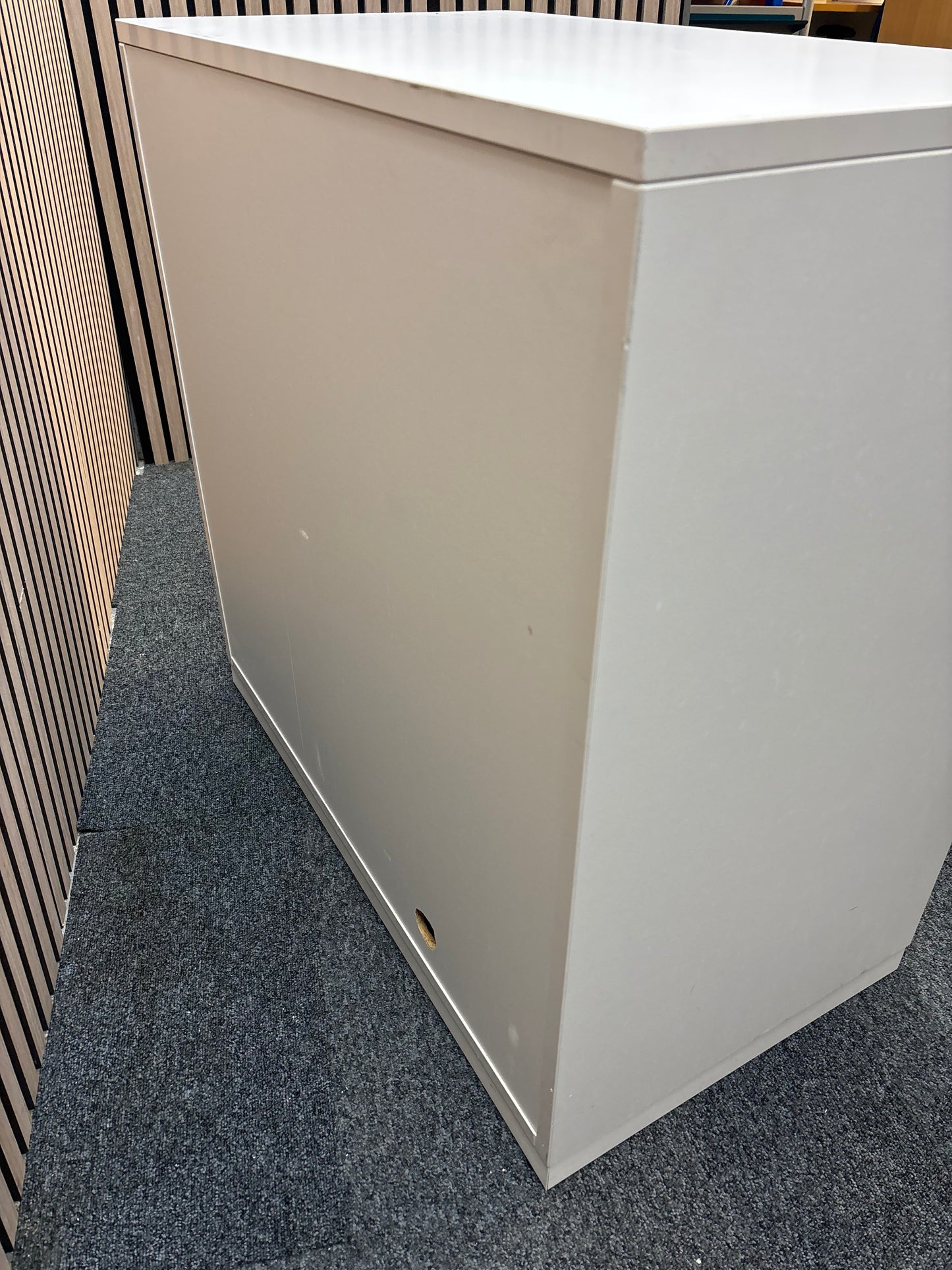 White wooden tambour unit with storage shelf and sliding door (H 79 x W 80 x D 43 cm)
