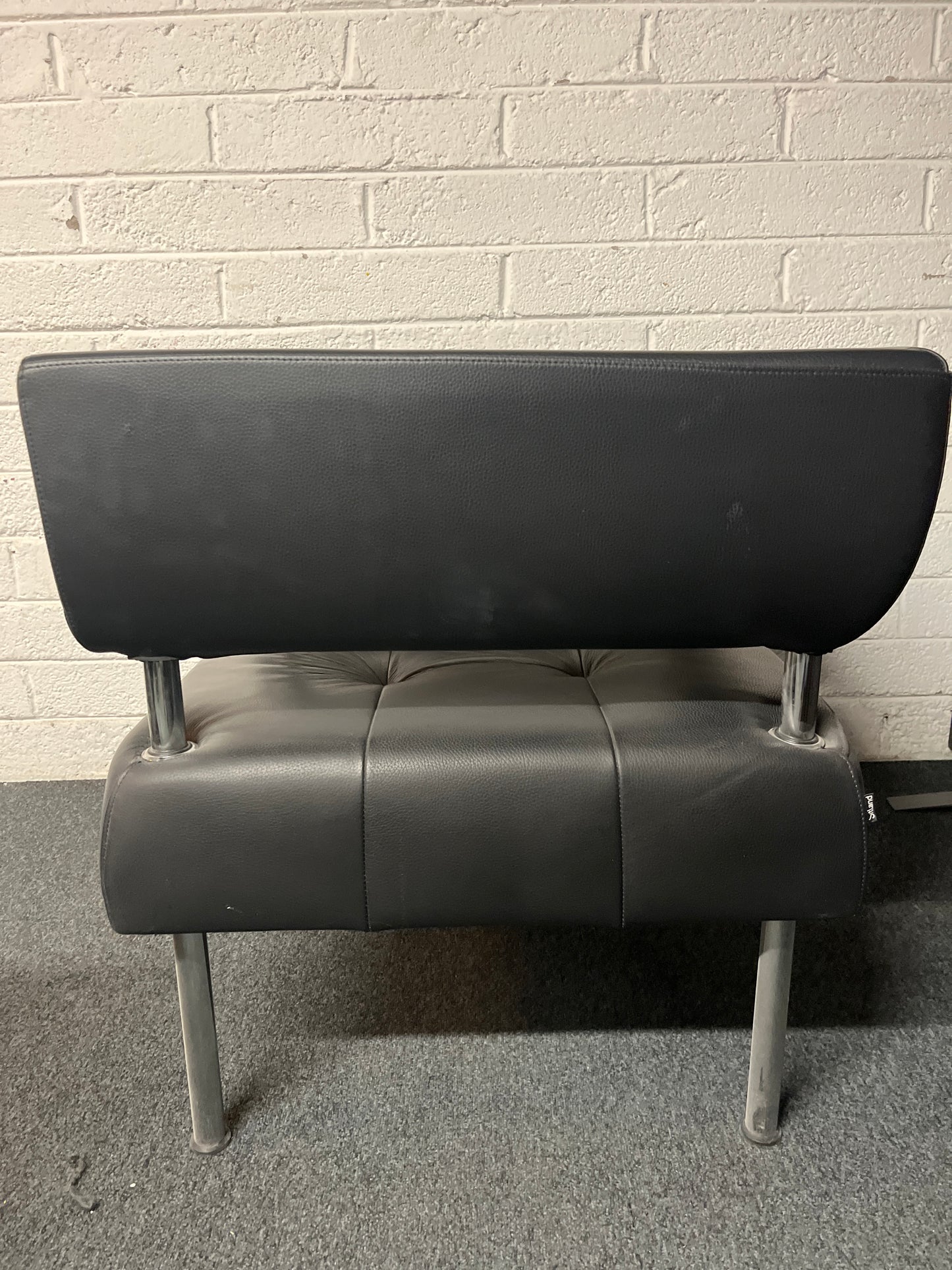 SECONDHAND Black leather chrome frame reception armchair