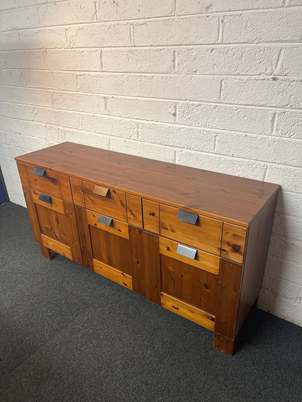 Long solid pine 3 door 3 drawer sideboard with black handles (H 74 x W 140 x D 40 cm) 1325