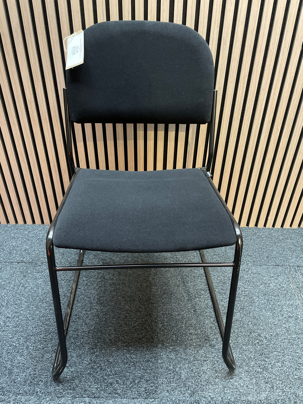 Jive fabric stacking chair with solid frame in black- no arms