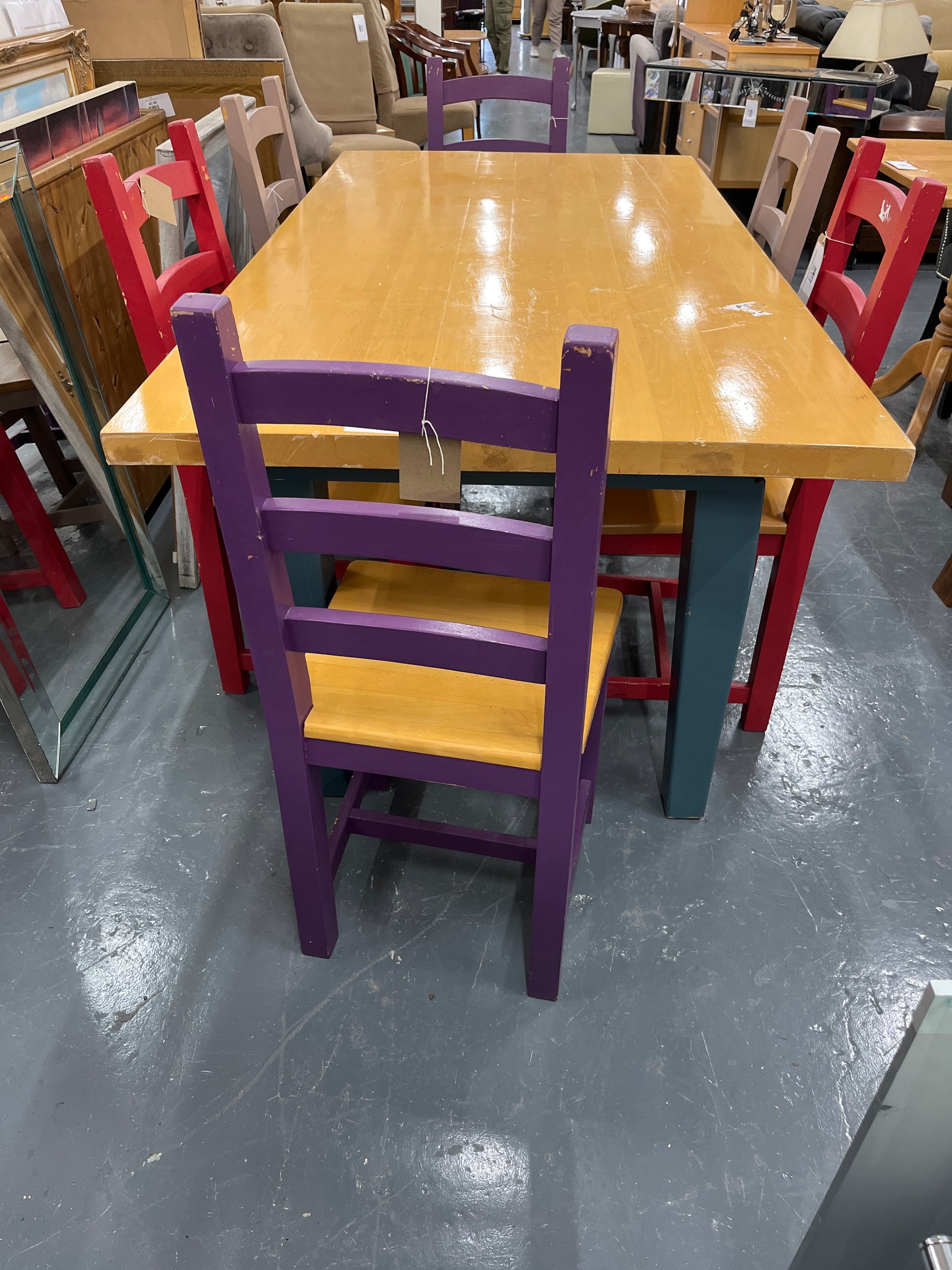Large beech dining table (L 1830 x W 930 mm)  with blue legs with 6 solid wood dining chairs in various colours (brown, red, purple) 1225