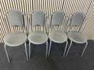 White circular plastic top table with 4 grey metal dining chairs   44652