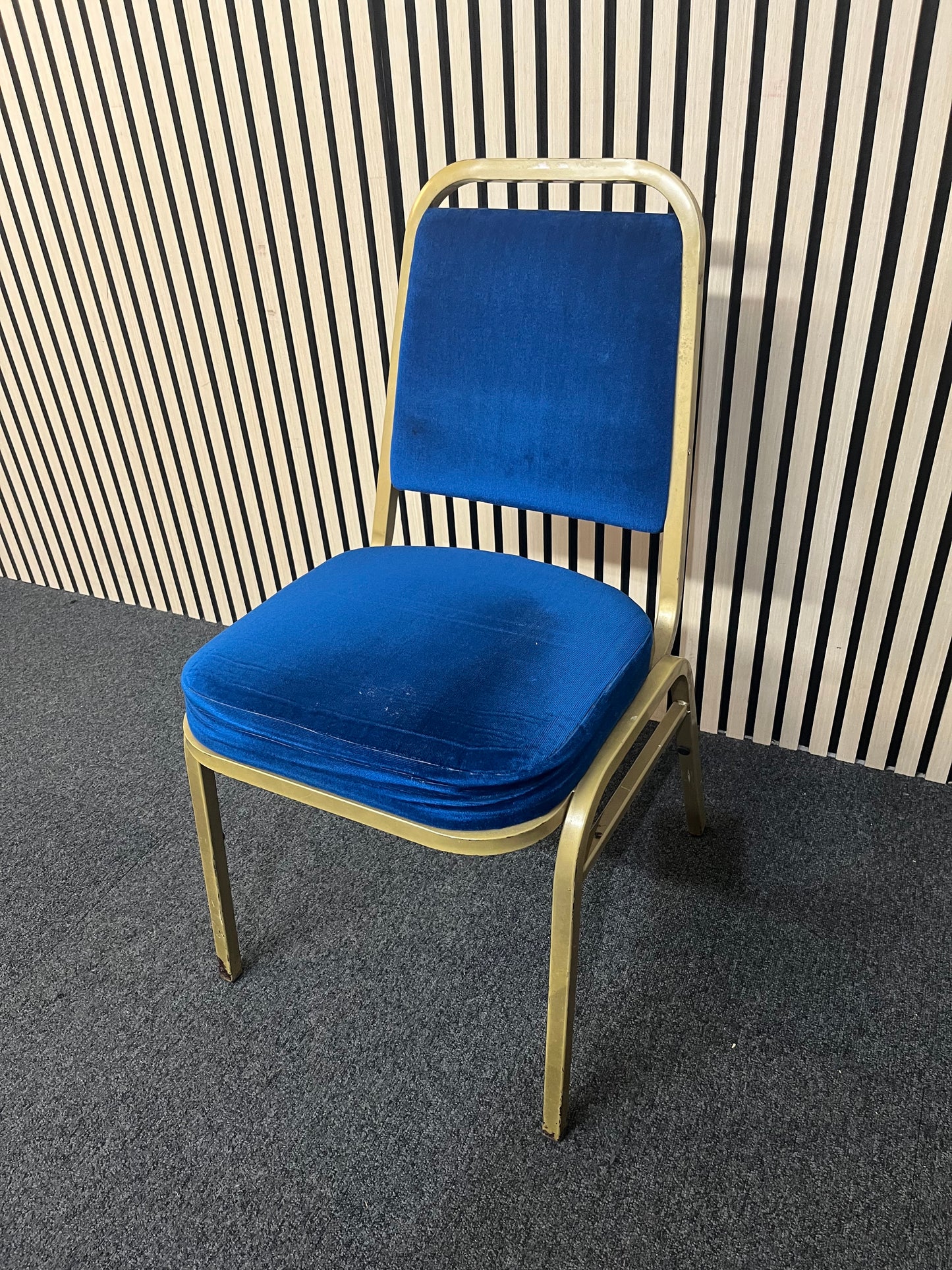 Blue fabric metal framed gold effect stacking banquet chair