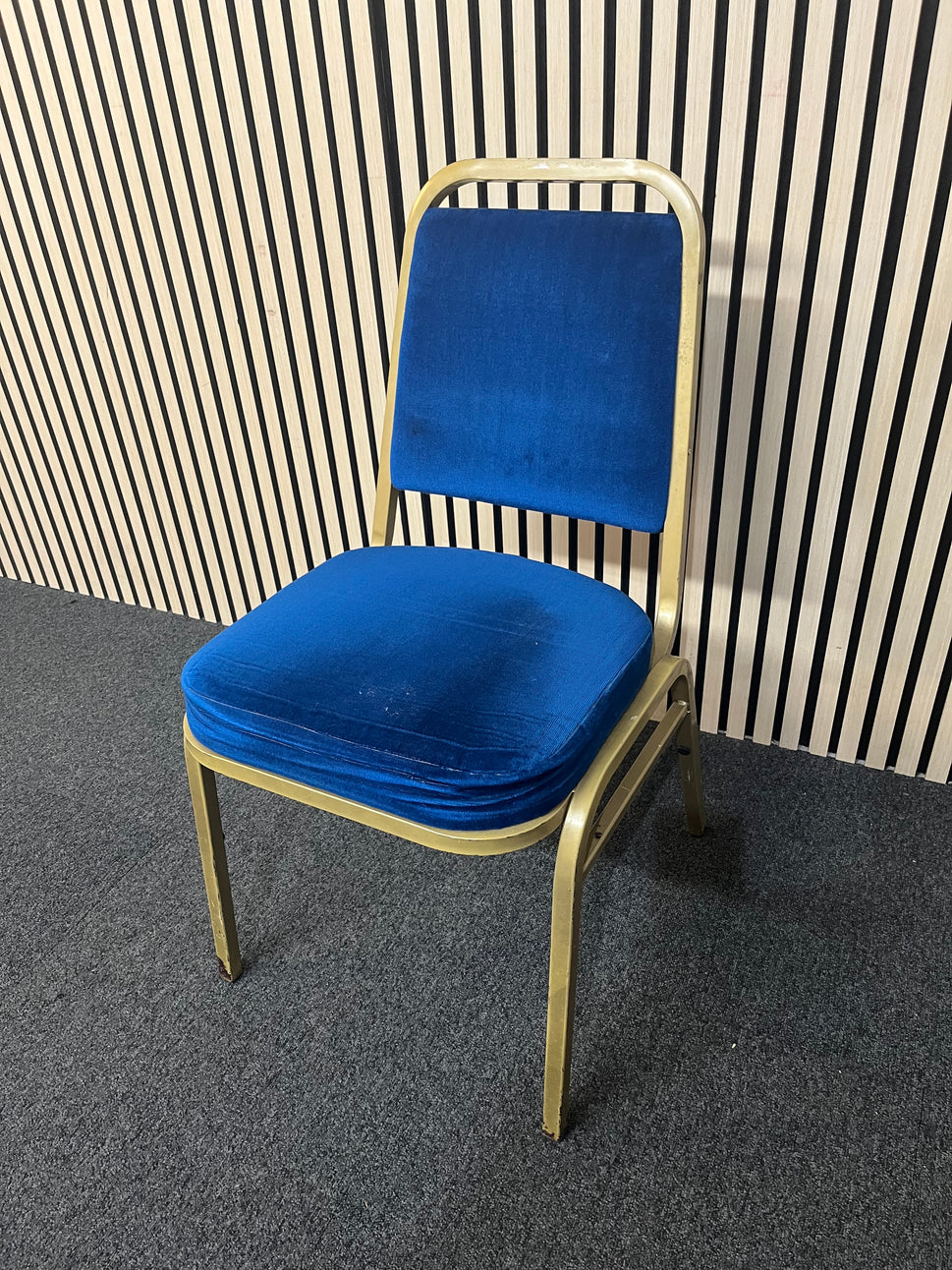 Blue fabric metal framed gold effect stacking banquet chair