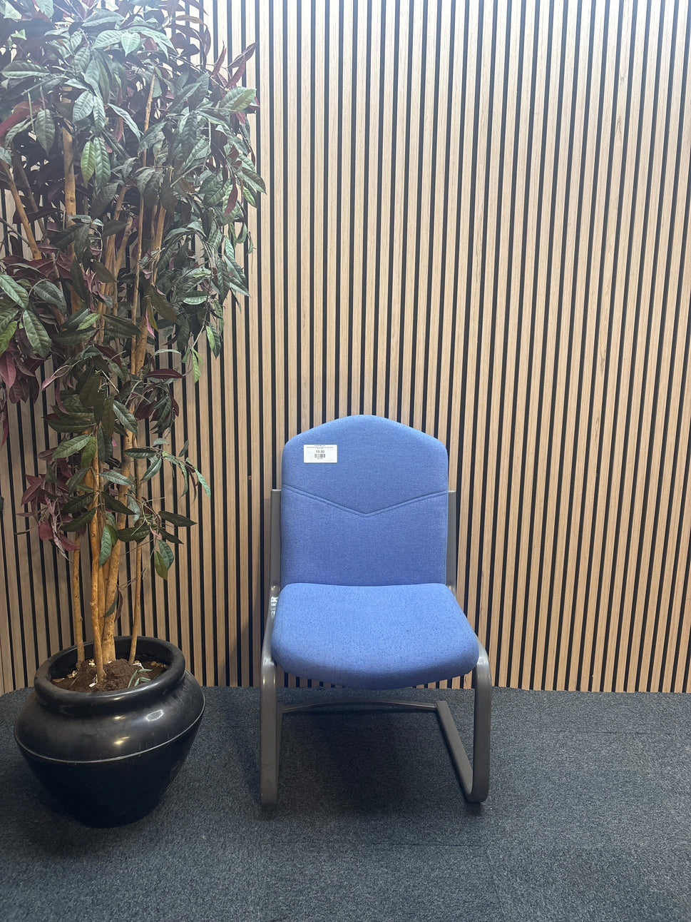 Light blue fabric cantilever meeting chair, grey powder coated frame