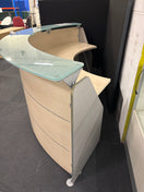 Switch SECONDHAND  Maple laminate half moon sectional reception counter with maple worktop, toughened and frosted glass tops 
134cm from outside to centre each section 2 image