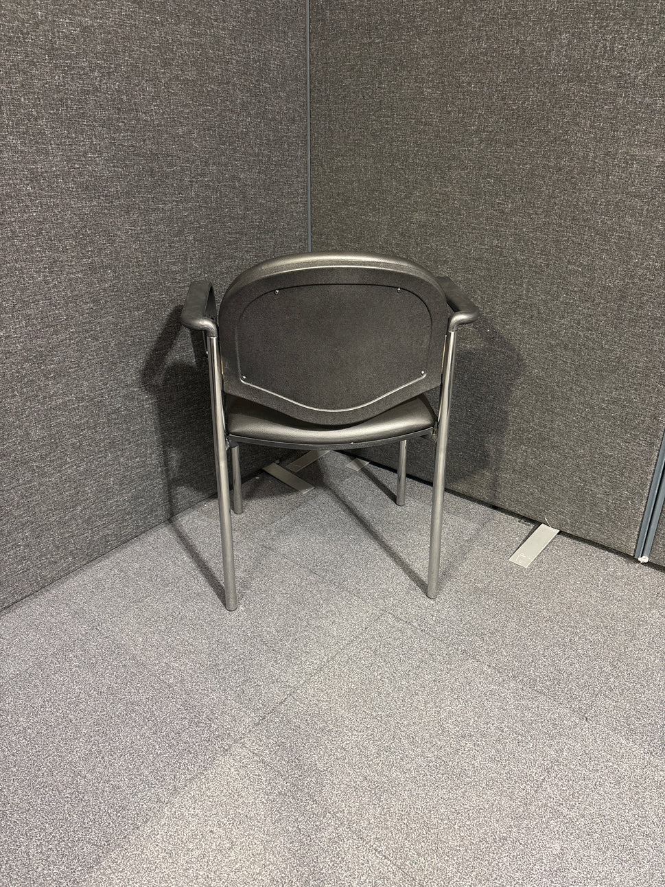 Chrome framed stacking Coda meeting chair with arms in black vinyl. Price inc VAT, Ex Demo stock, Like NEW