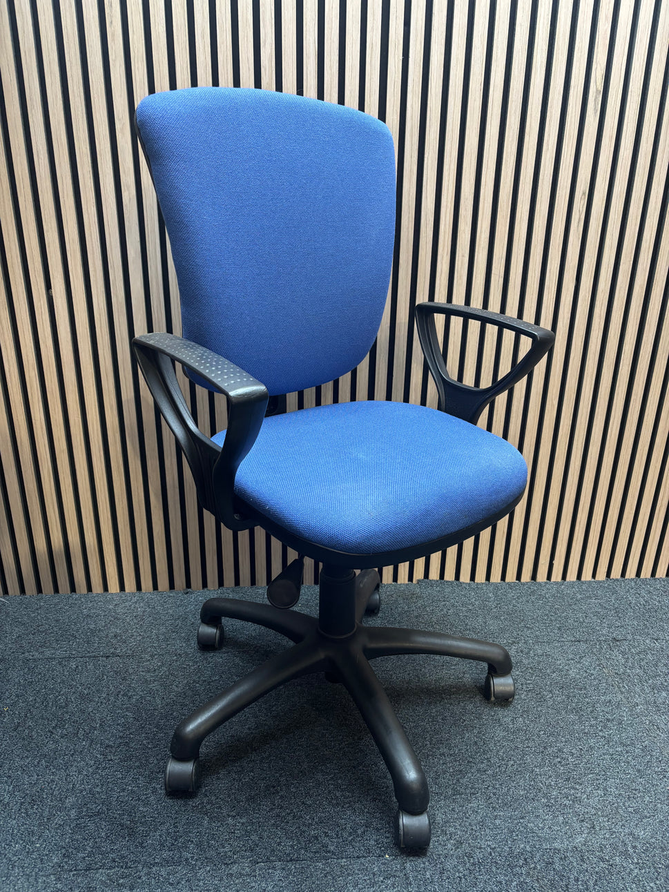 Shaped medium back blue fabric swivel chair with loop arms