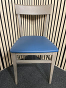 Modern grey cafe chair with blue faux leather seat.  44552