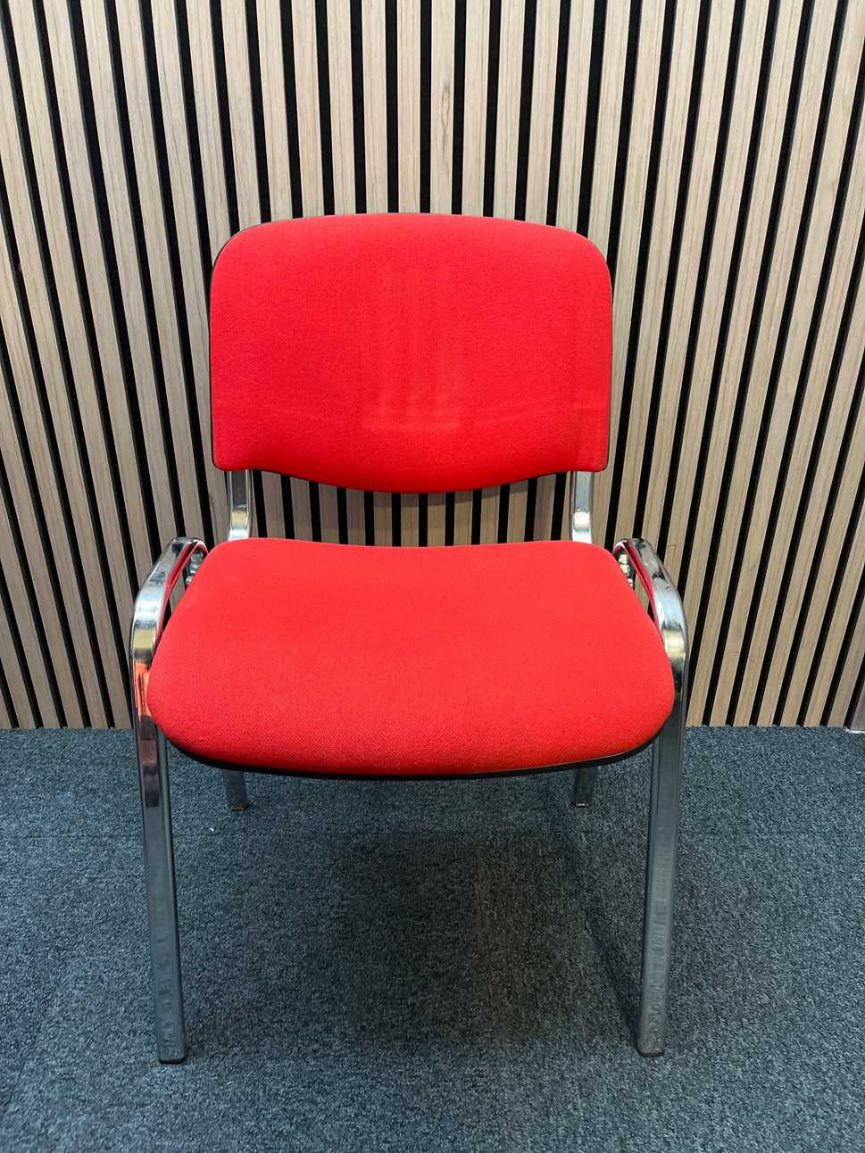 Red fabric stacking conference chair with chrome frame