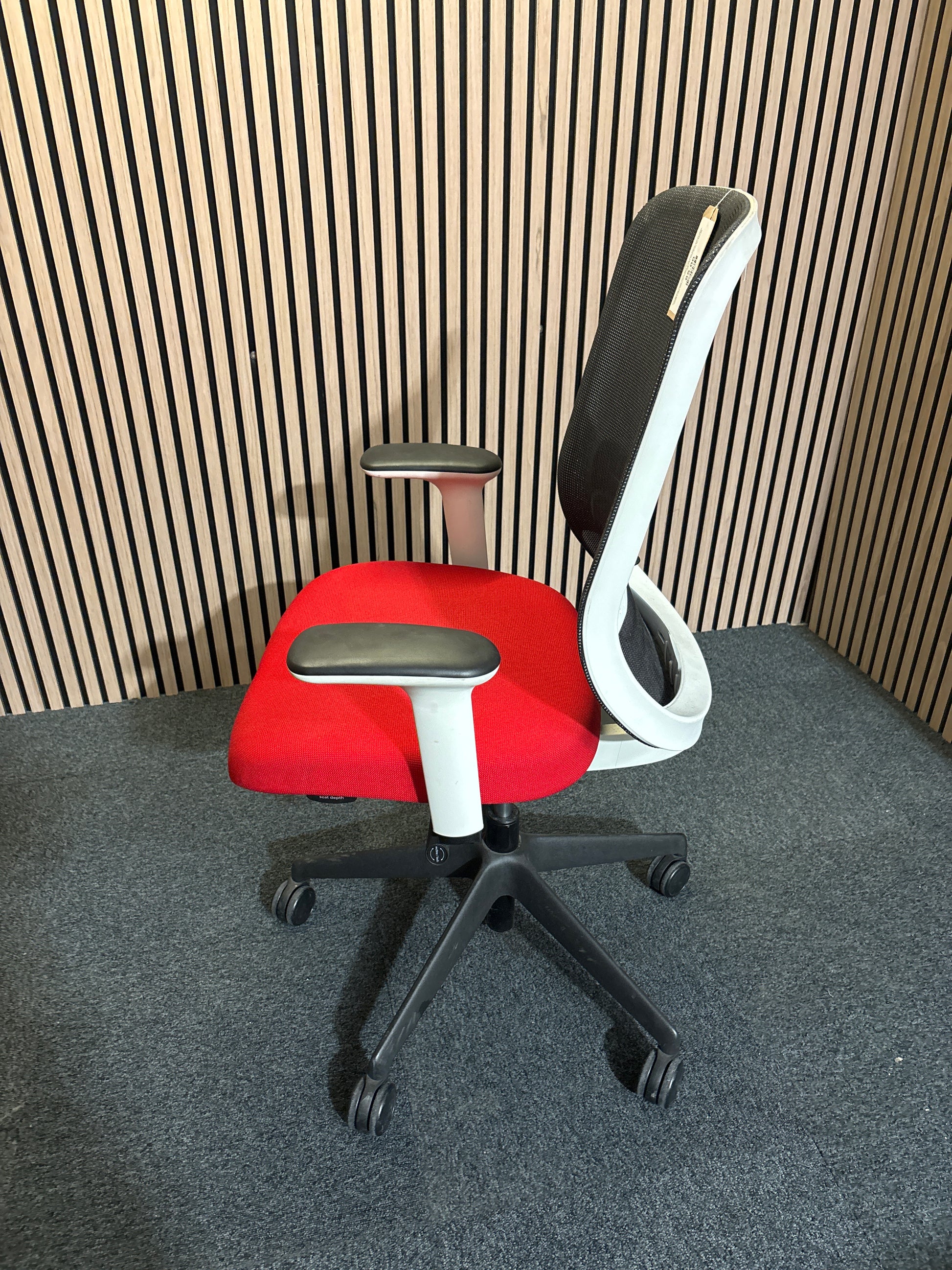 Orangebox mesh back, dark grey seat fabric swivel chair, metal 5 star base on castors. Add Add arms for €40.00  1425