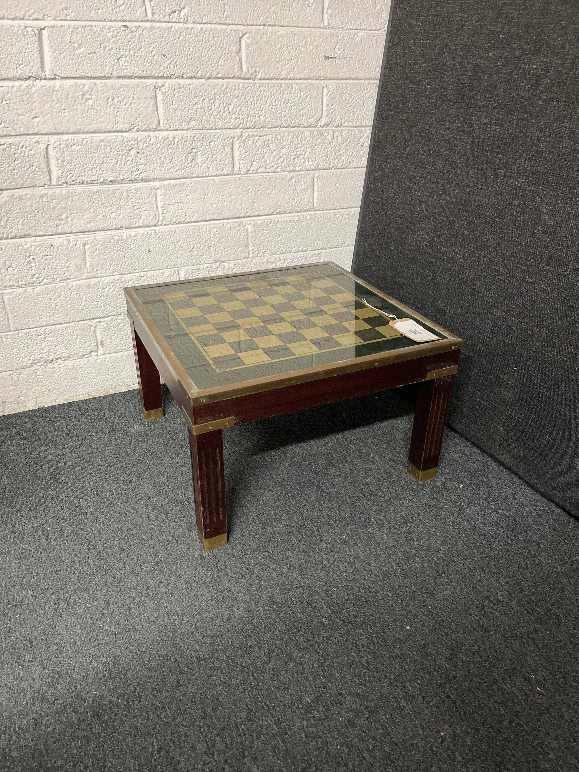 Low mahogany ornate glass top chess board coffee table 2225