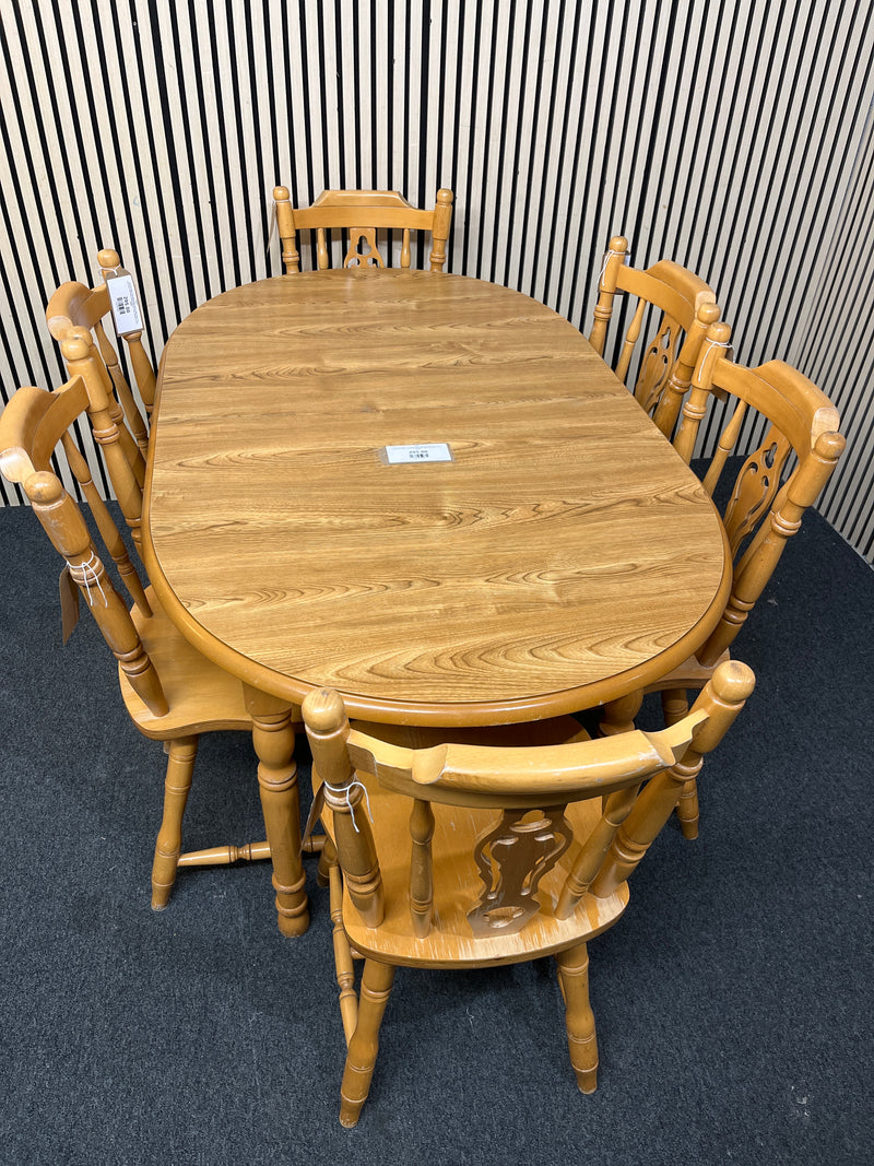 Oak laminate oval extendable dining table with 6 no. matching solid wood chairs W148 to 188 extended x 87D  44459