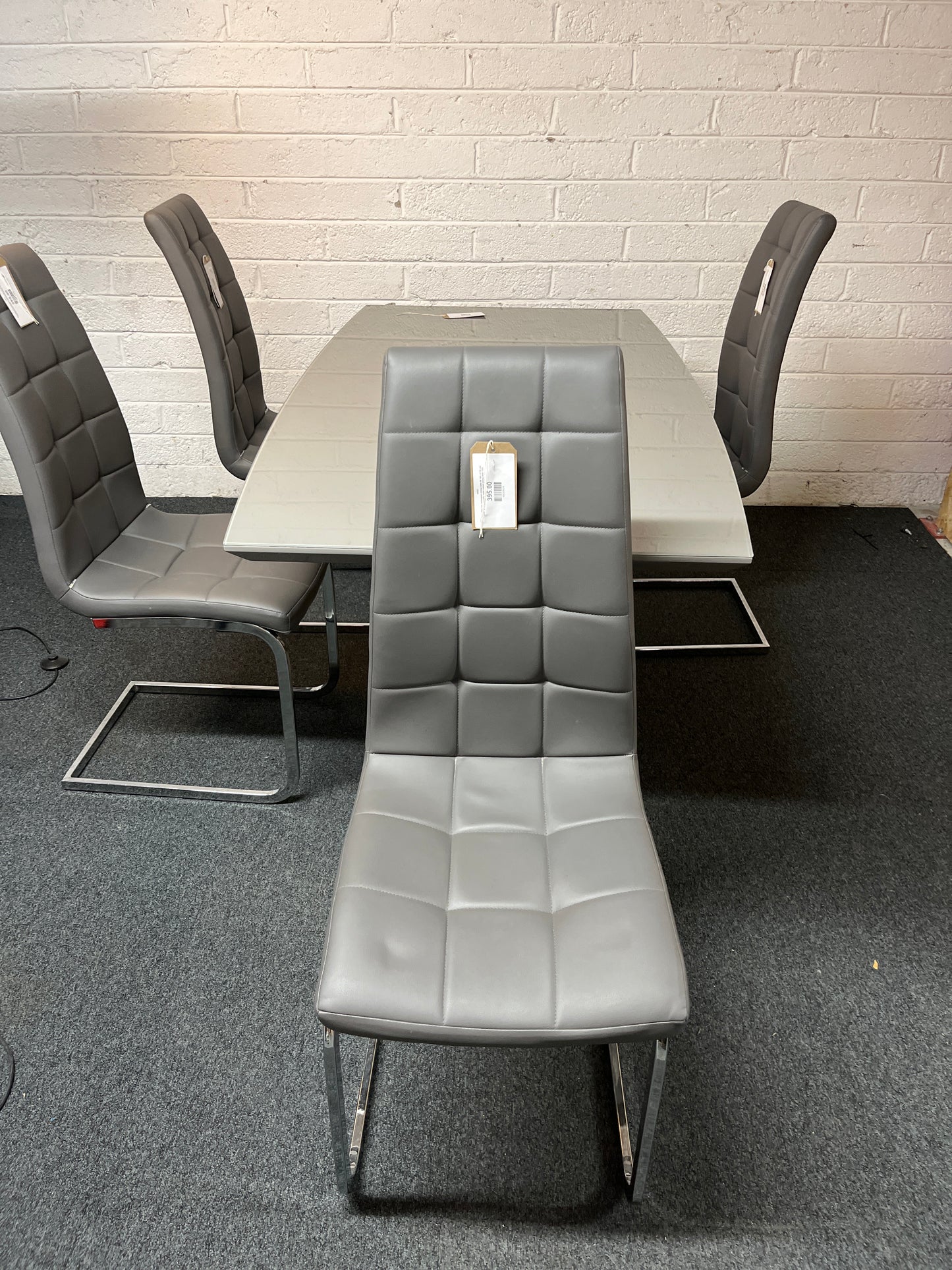 Grey glass top rectangular dining table (W 160 x D 90 cm) and 4 grey leatherette metal framed dining chair 1325