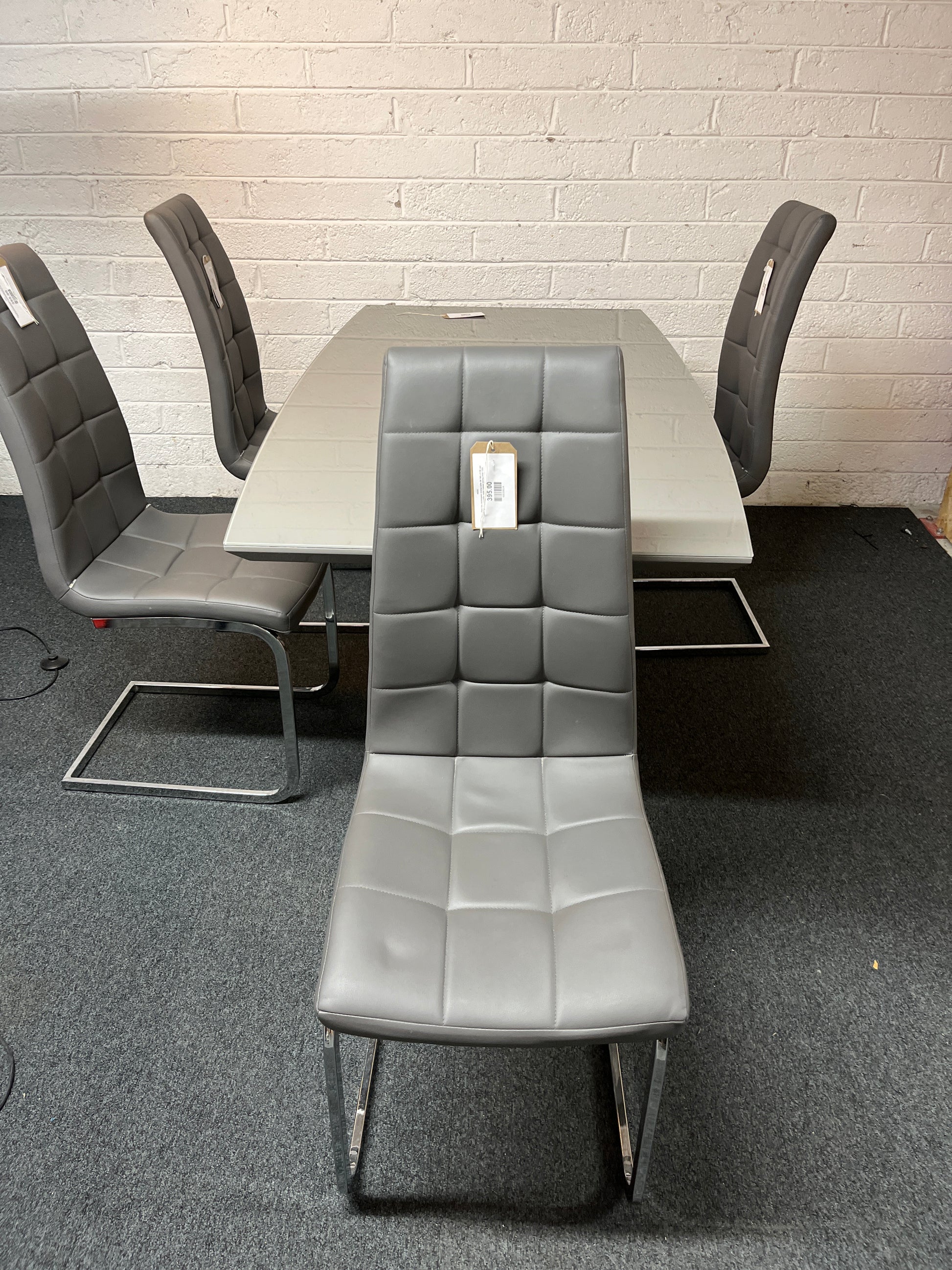 Grey glass top rectangular dining table (W 160 x D 90 cm) and 4 grey leatherette metal framed dining chair 1325