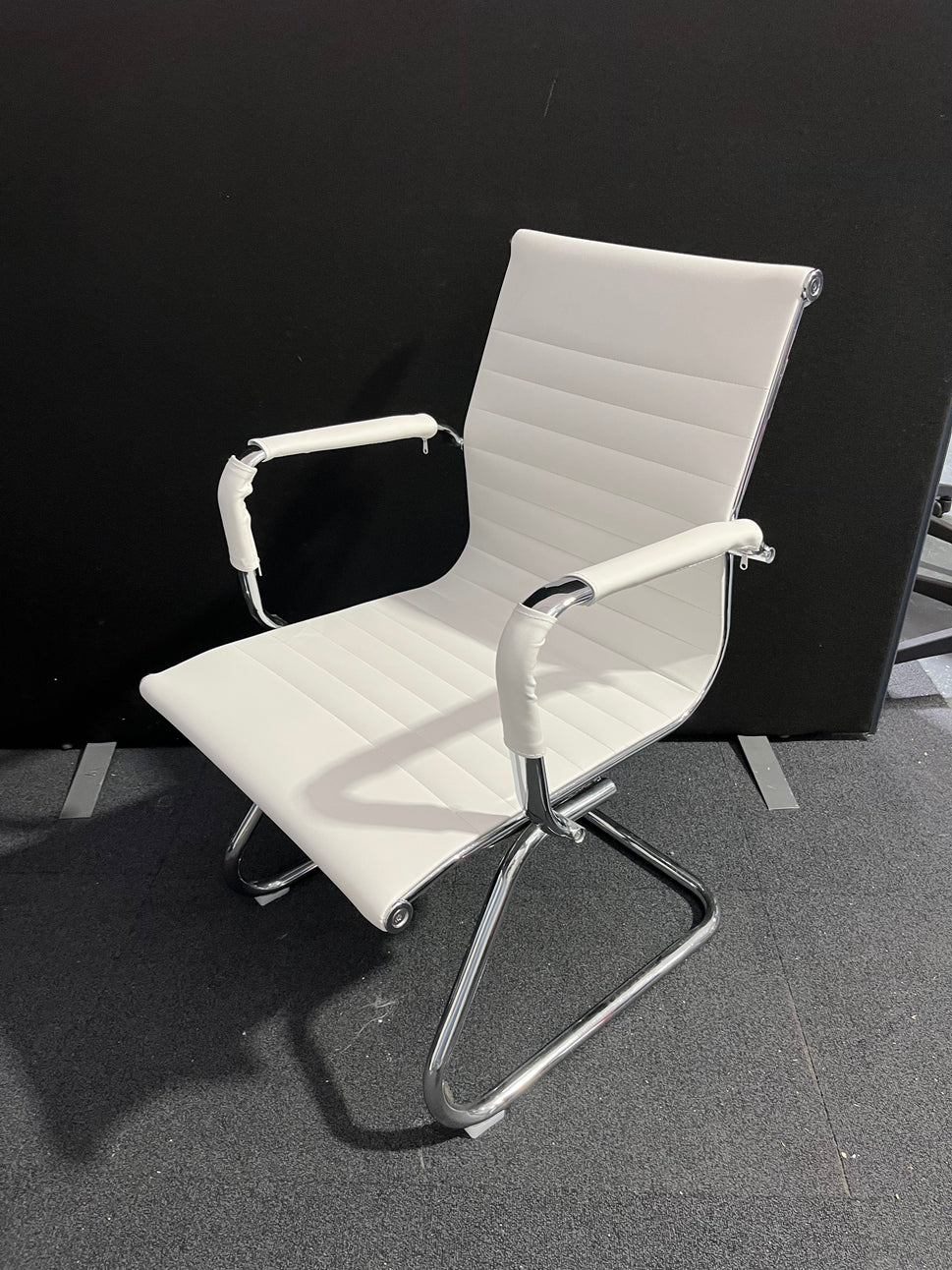 Cream leather chrome framed cantilever meeting chair
