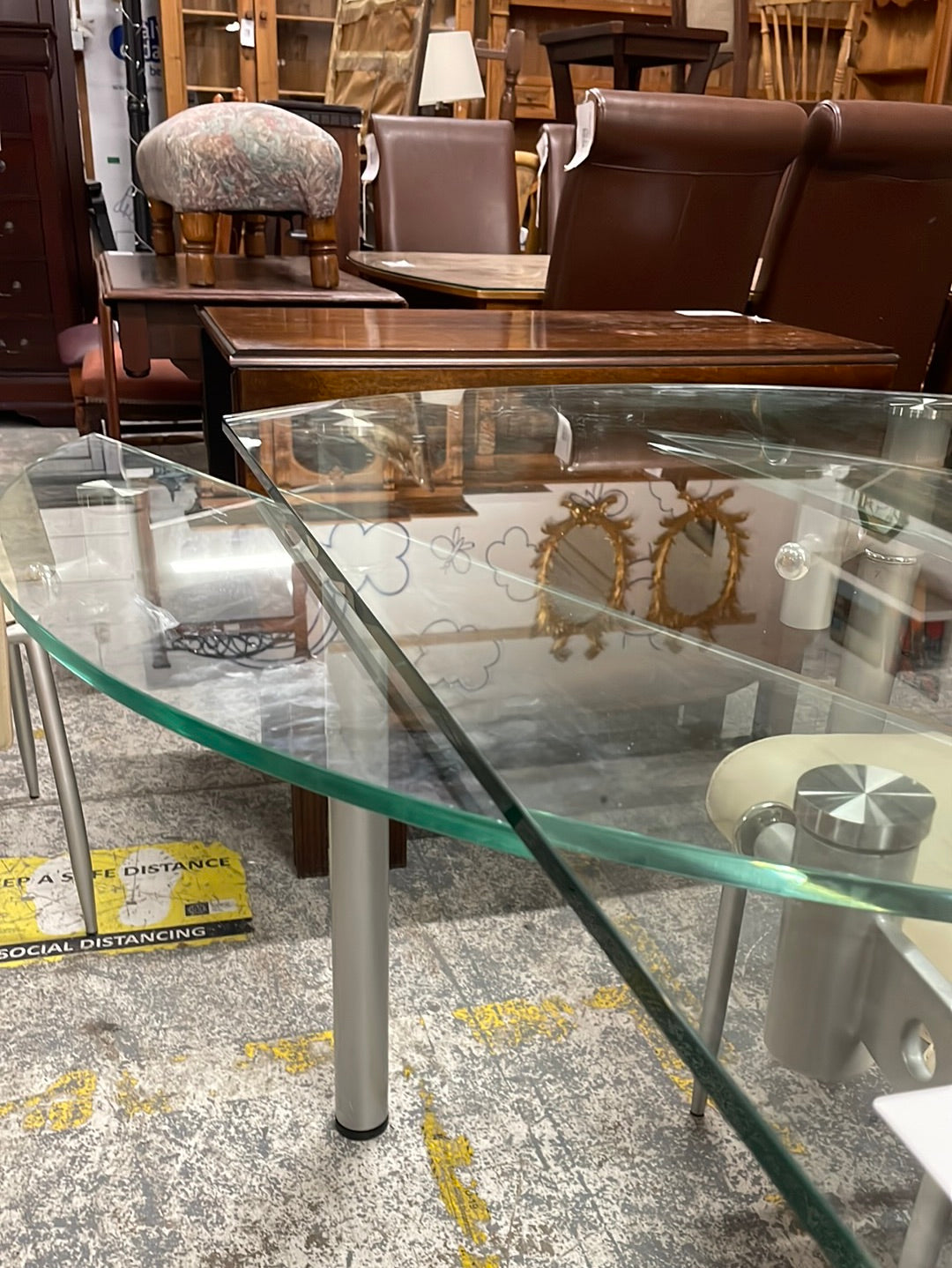 Circular extendable glass and chrome kitchen table CJM Furniture