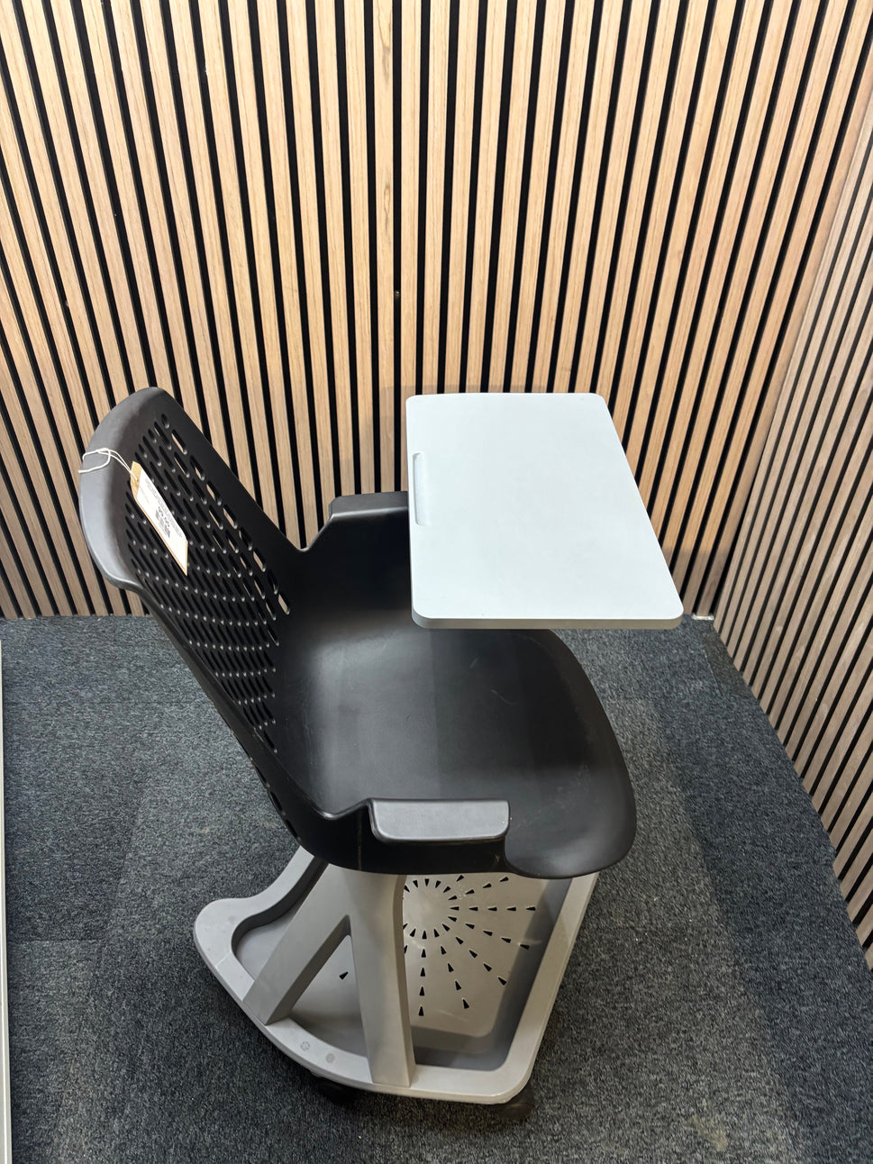 Report mobile conference chair with writing tablet on castors, black plastic seat, dark grey writing tablet with drinks holder. 90Hx64Wx59H. Seat height 445mm