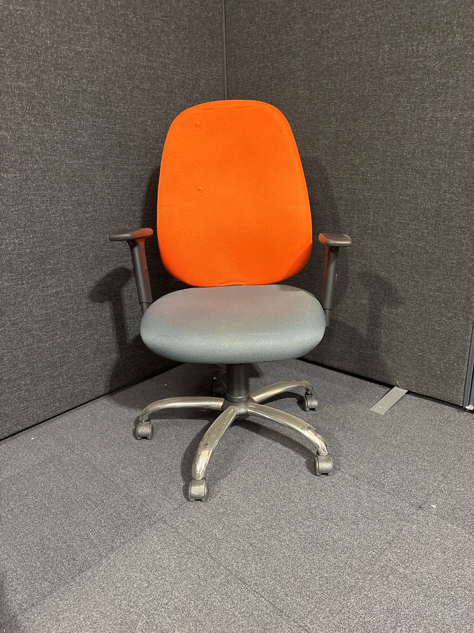 Two tone orange and grey high back swivel chair with height adjustable arms