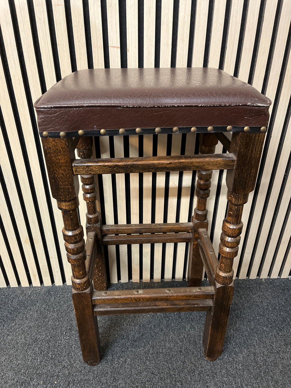 Tall solid wood bar stool with brown leatherette seat top 2425