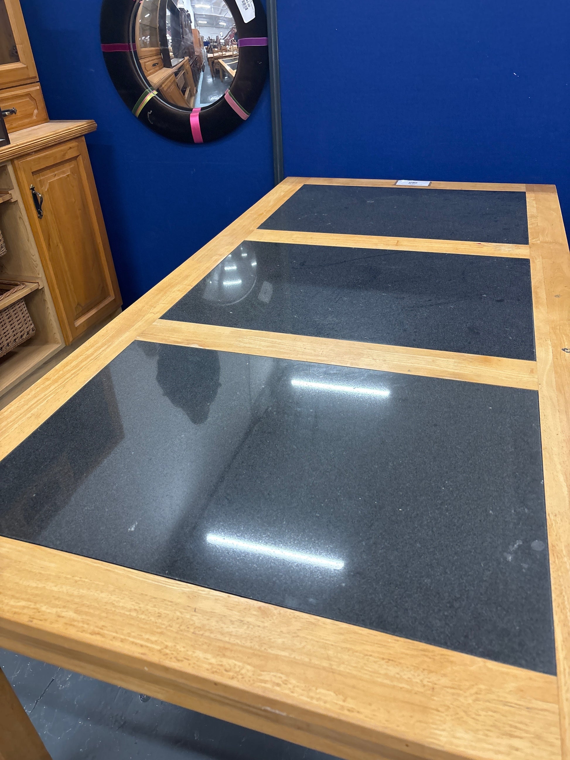 Hardwood large rectangular kitchen table with black granite inserts