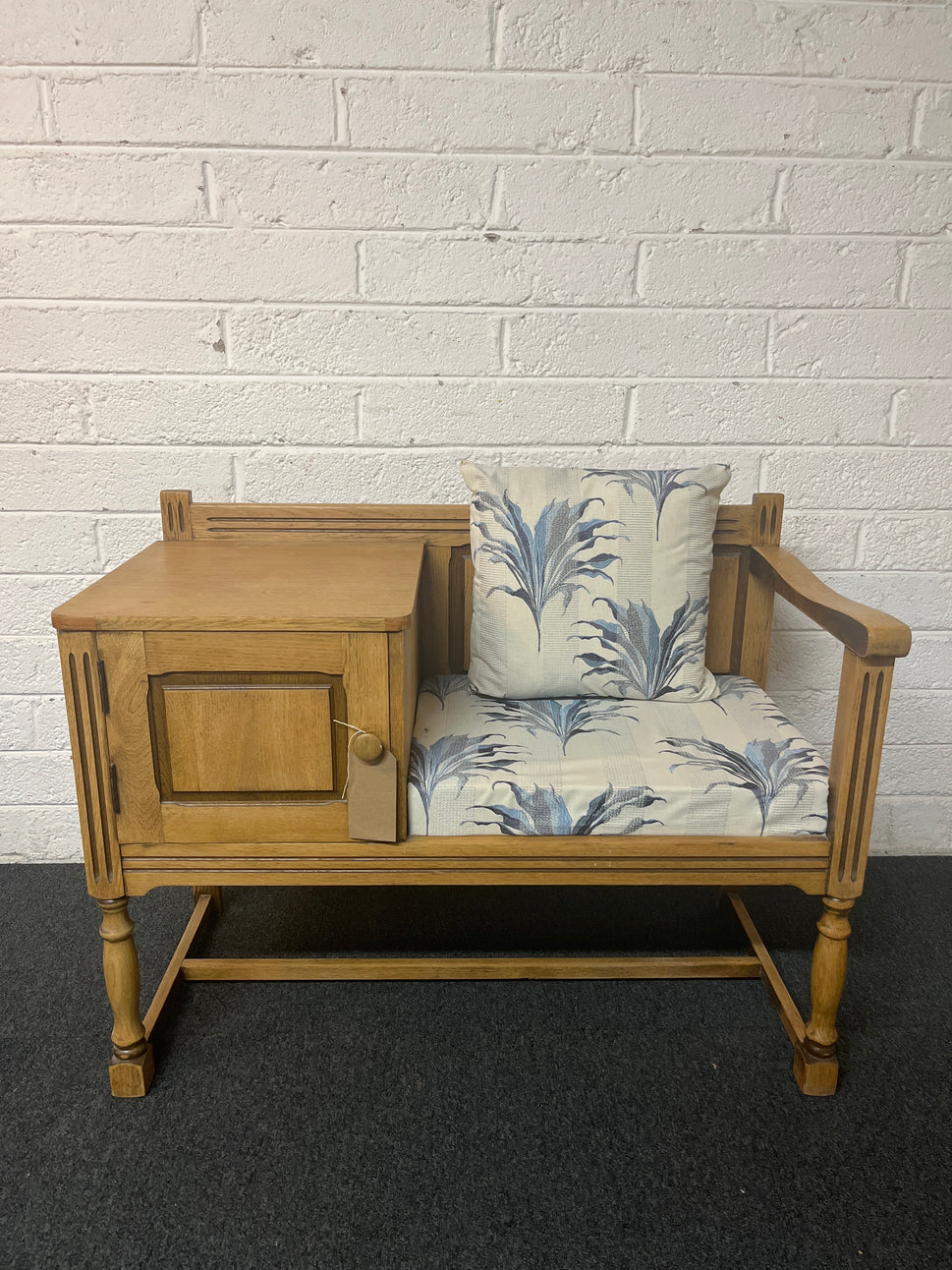 Oak telephone table with blue and cream floral fabric seat and storage drawer 1325