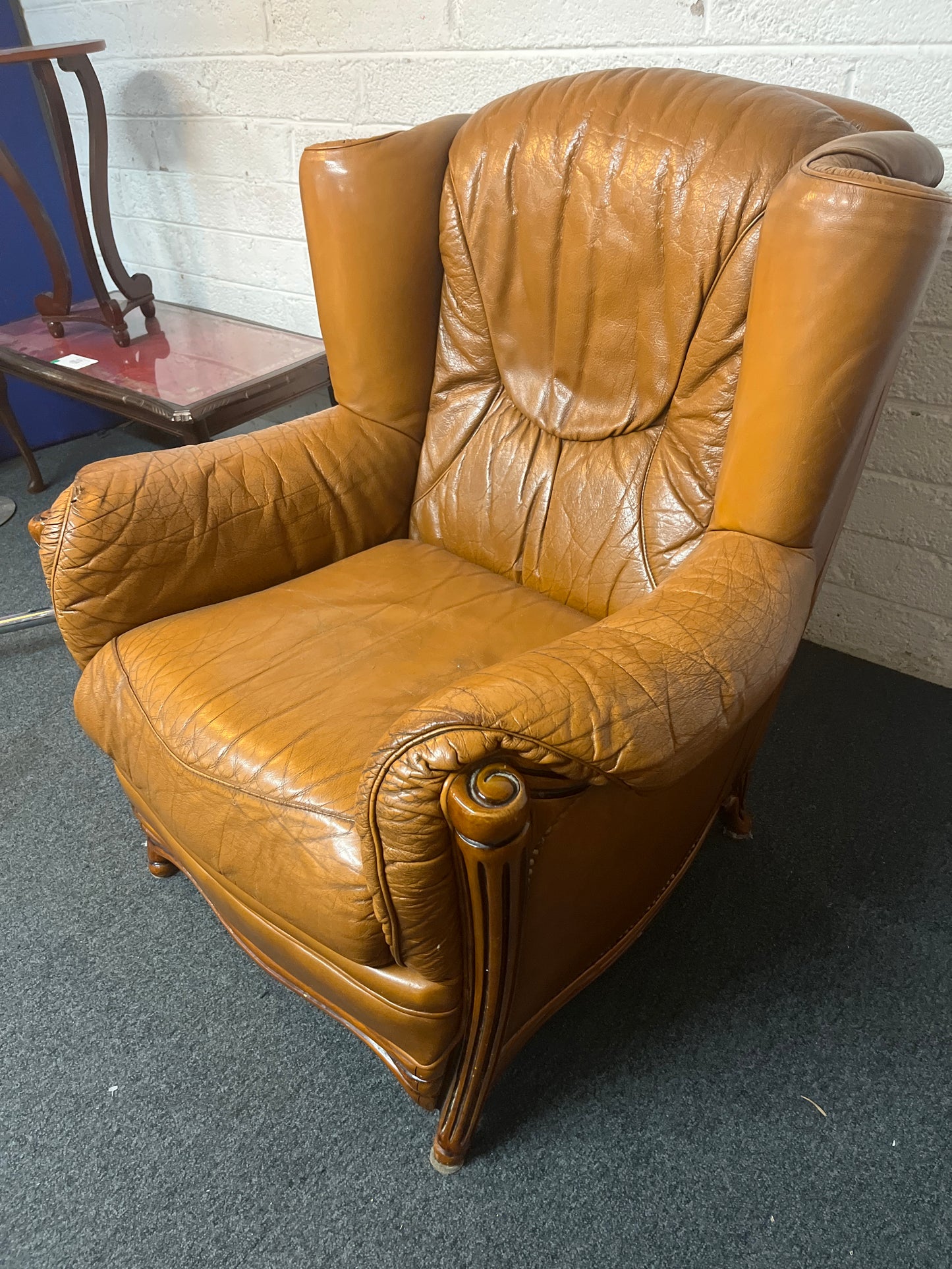 Real tan leather armchair with oak frame