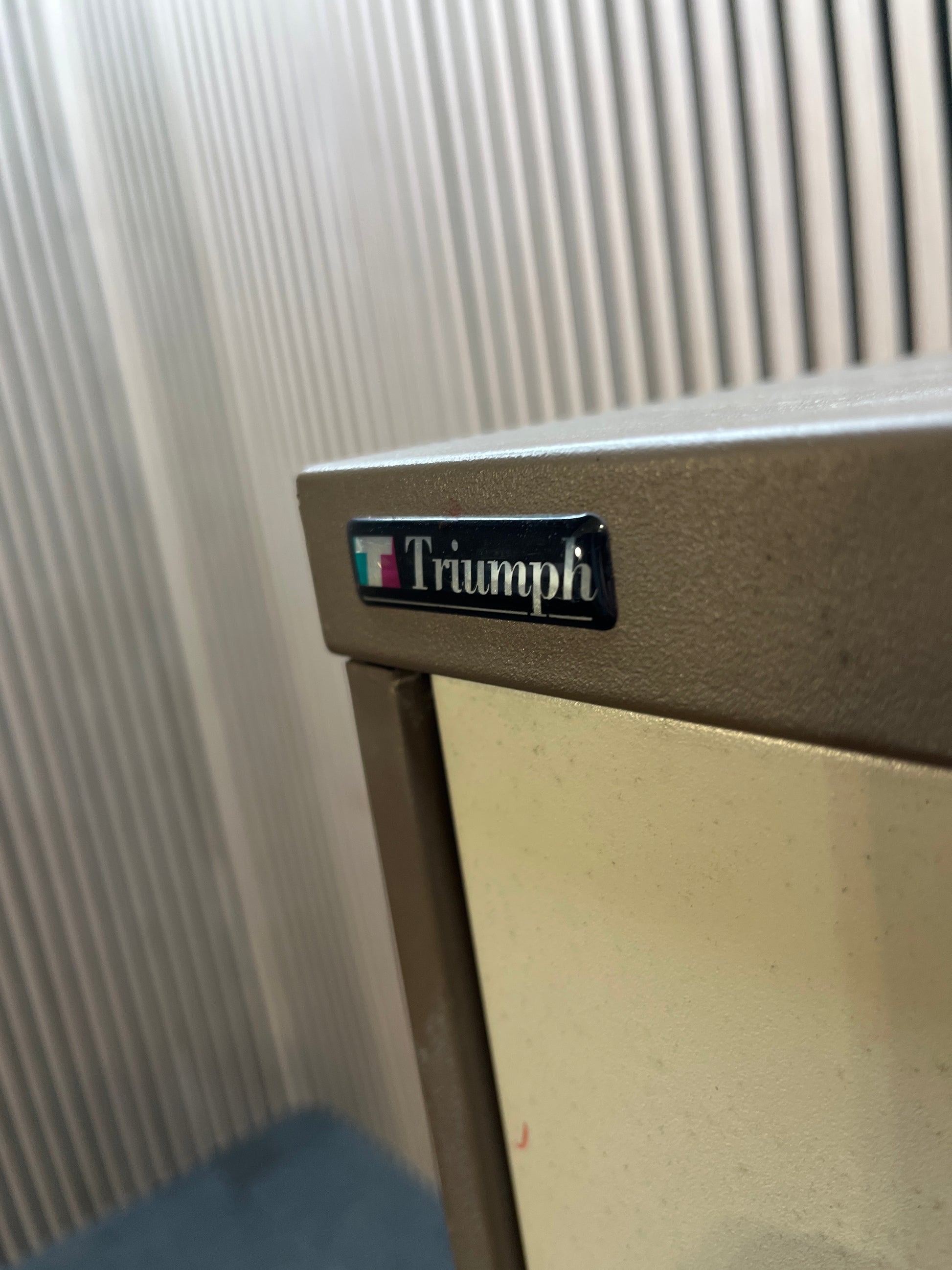 Coffee and cream metal Triumph 4 drawer filing cabinet with key