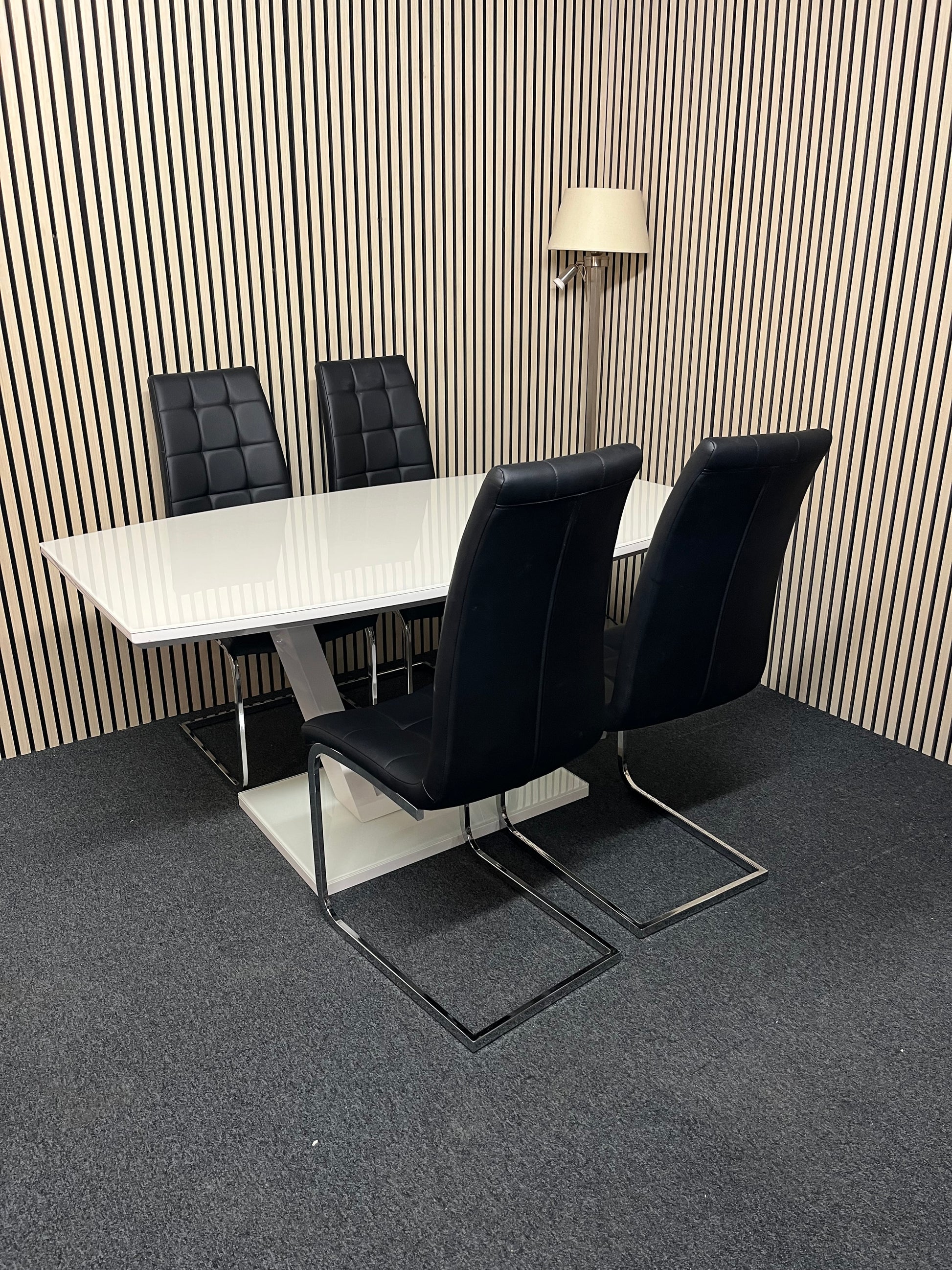 High polished glass modern dining table with 4 no. matching leather cantilever chairs 1325
