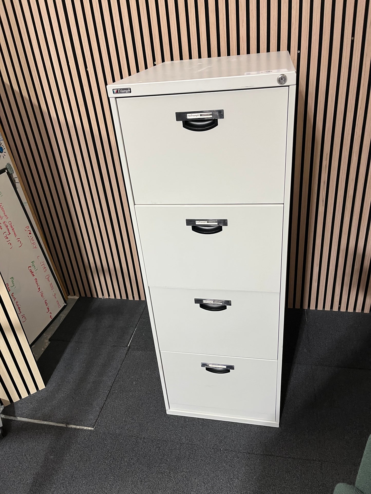 Grey metal 4 drawer filing cabinet