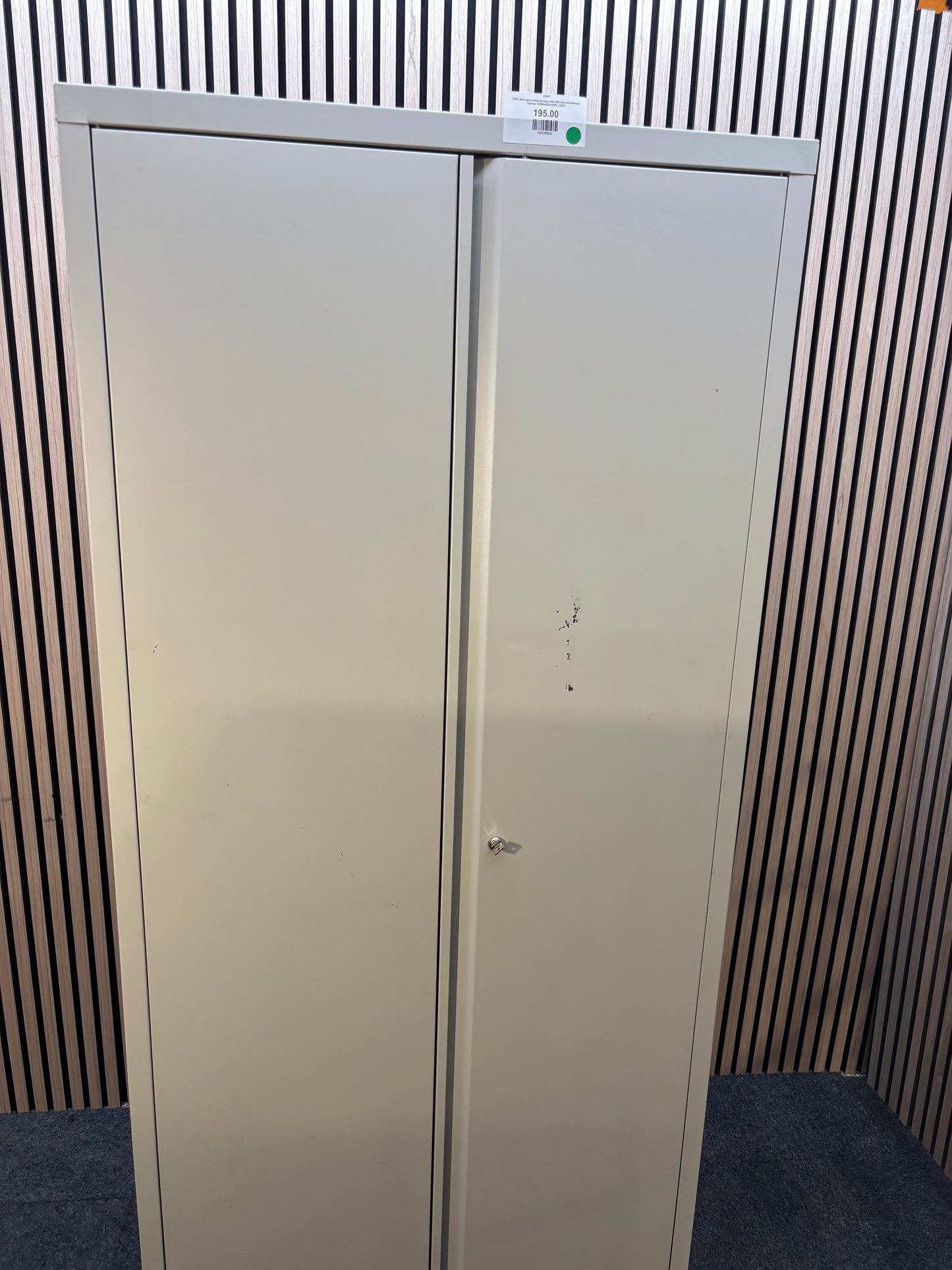 Tall 2 door grey metal storage uniit with key and internal shelves 910Wx40Dx195H  J3937