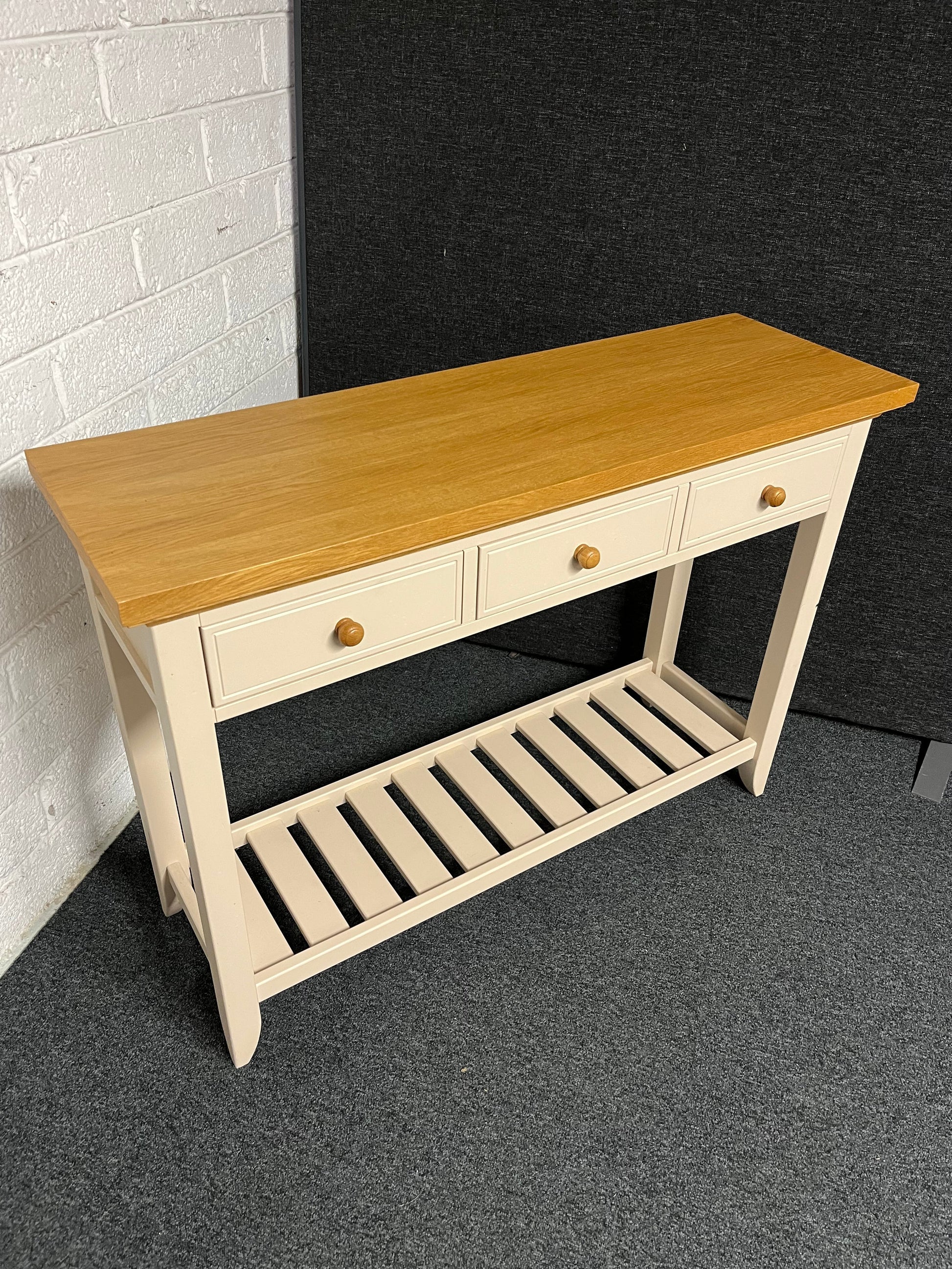 Solid oak top slim console table with cream painted frame, 3 drawers and shelf  1225