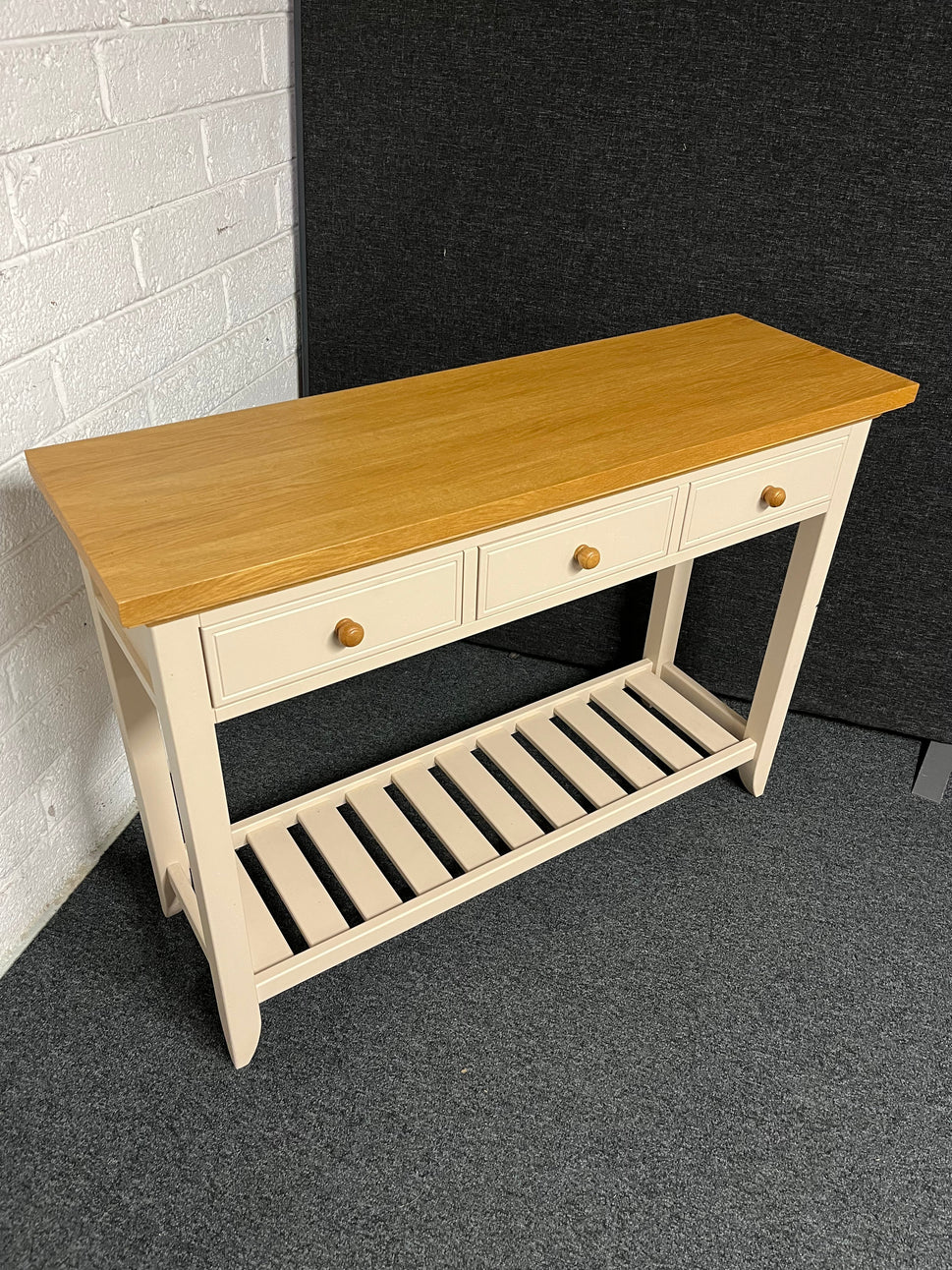 Solid oak top slim console table with cream painted frame, 3 drawers and shelf  1225