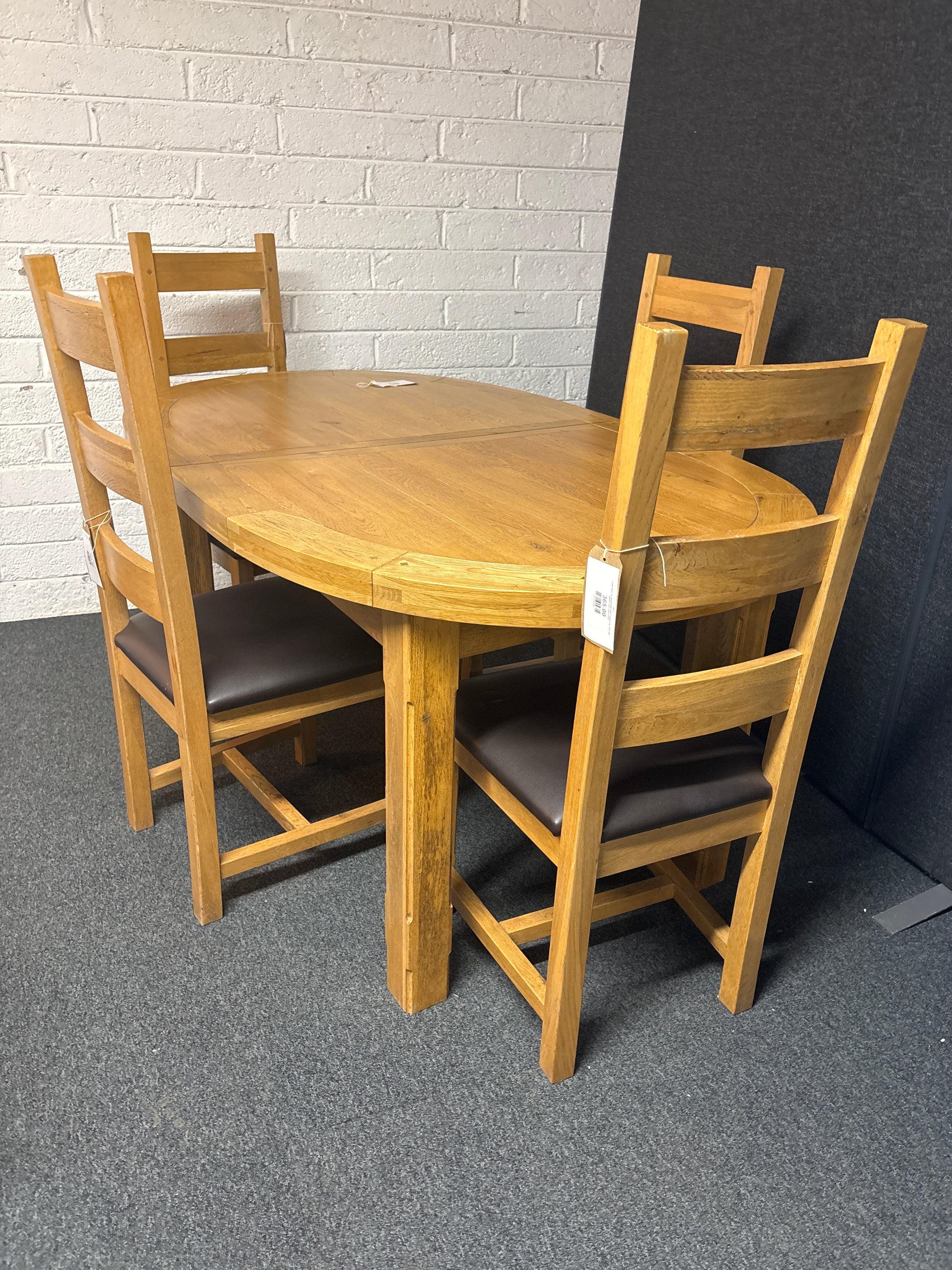 Large solid oak dining table with 4 matching solid oak leather seat chairs 2225
