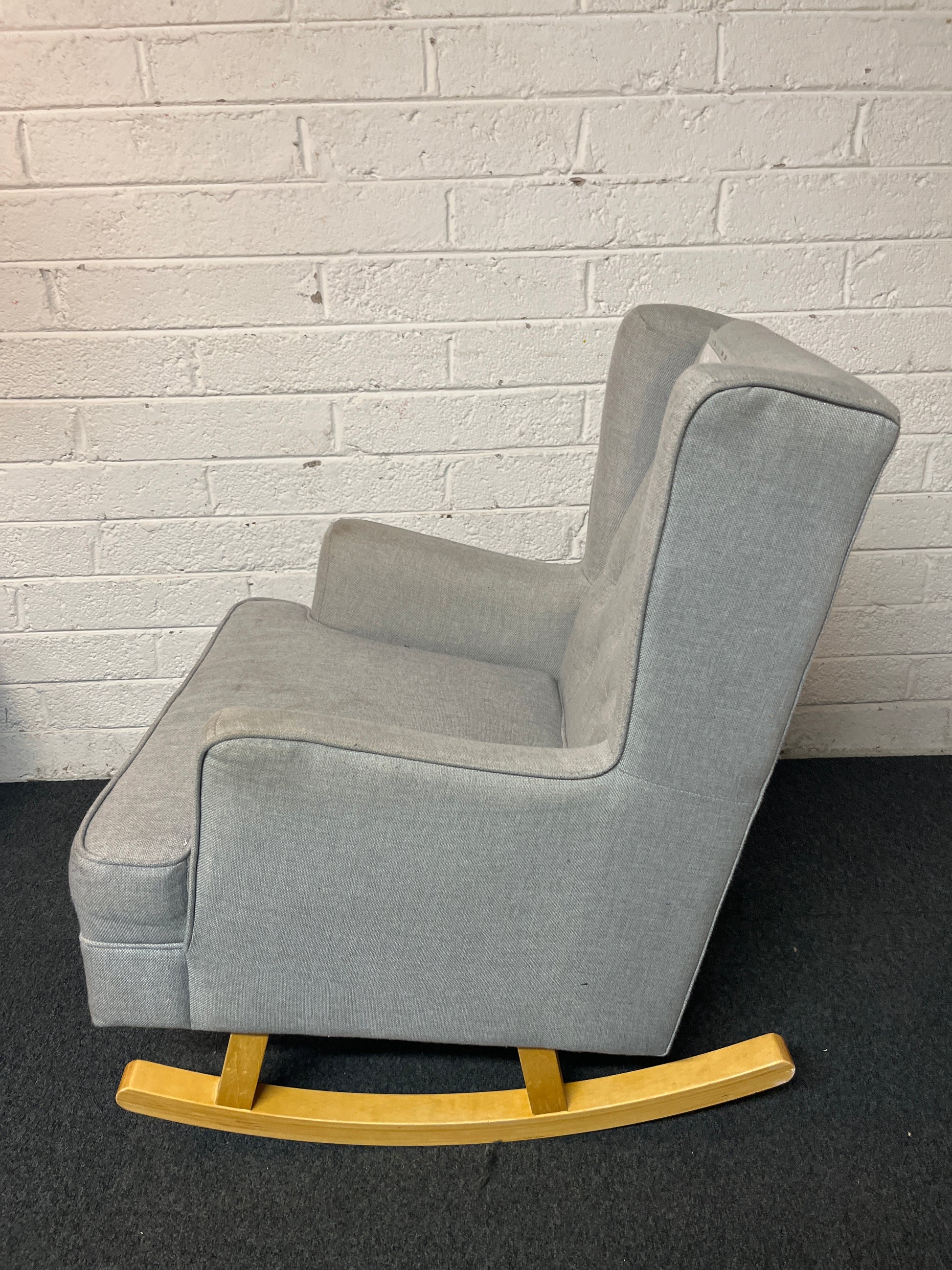 Light grey fabric button back wing armchair on rocking wood frame 1325