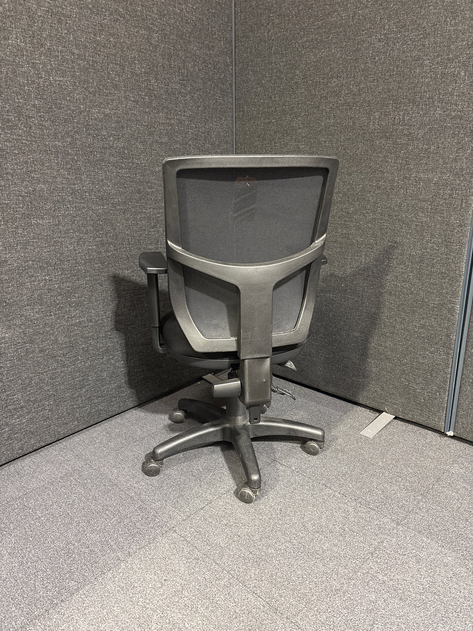 Black mesh back black fabric seat swivel chair with height adjustable arms