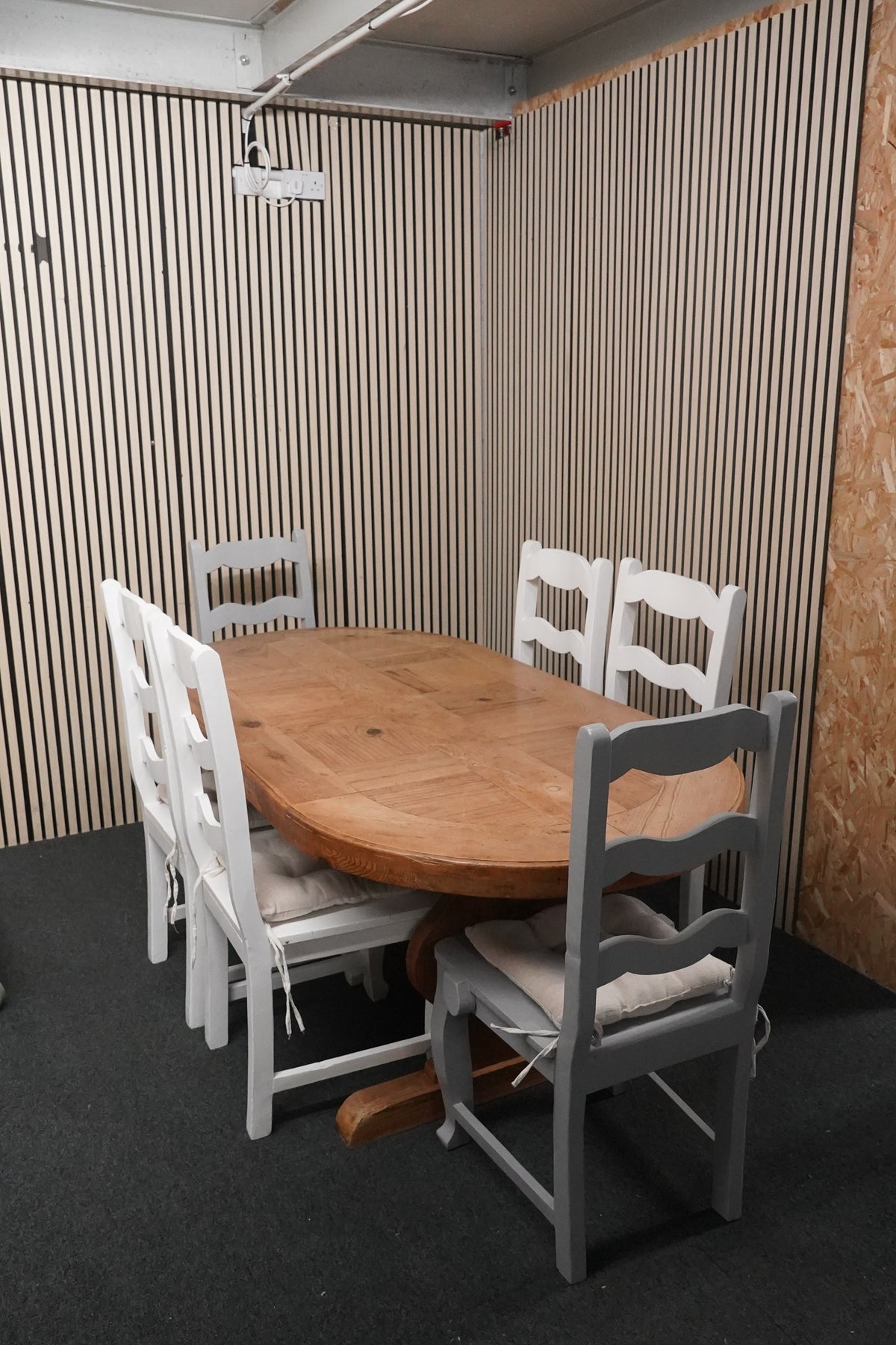 Parquet pitch pine oval table with six painted ladder-back chairs (L 200 x W 100 cm)  44342