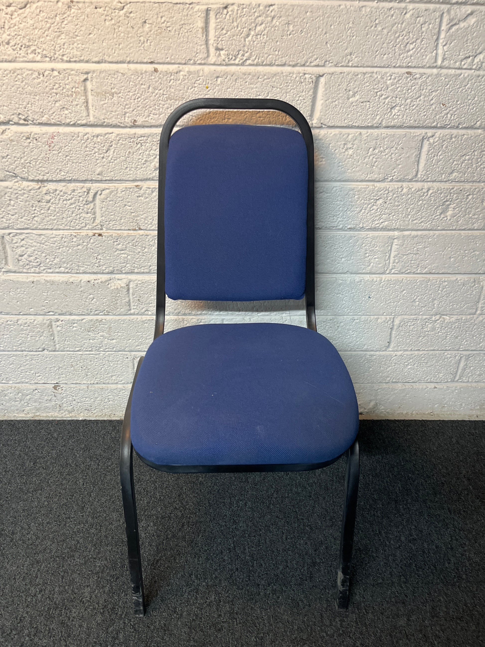 SECONDHAND black metal blue fabric stacking chair