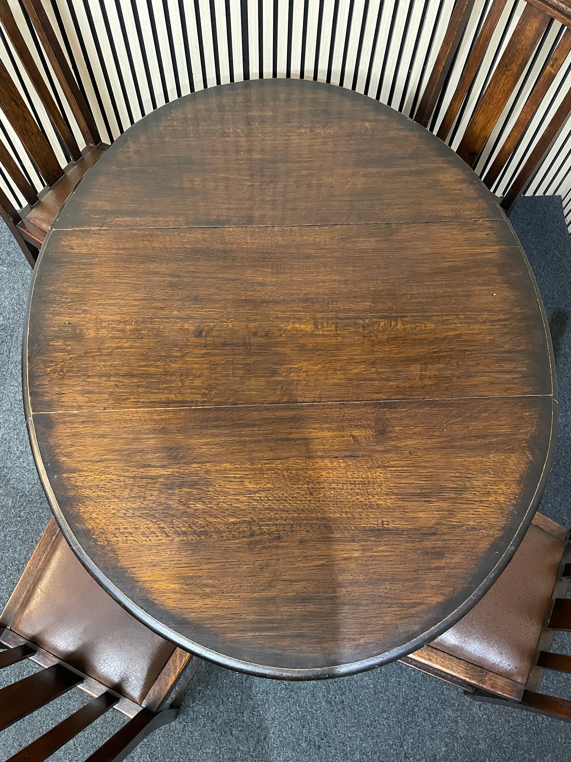 Drop leaf dark oak stained oval dining table, barley twist legs (W 109 x L 135 cm) with 4 no. matching chairs  3126