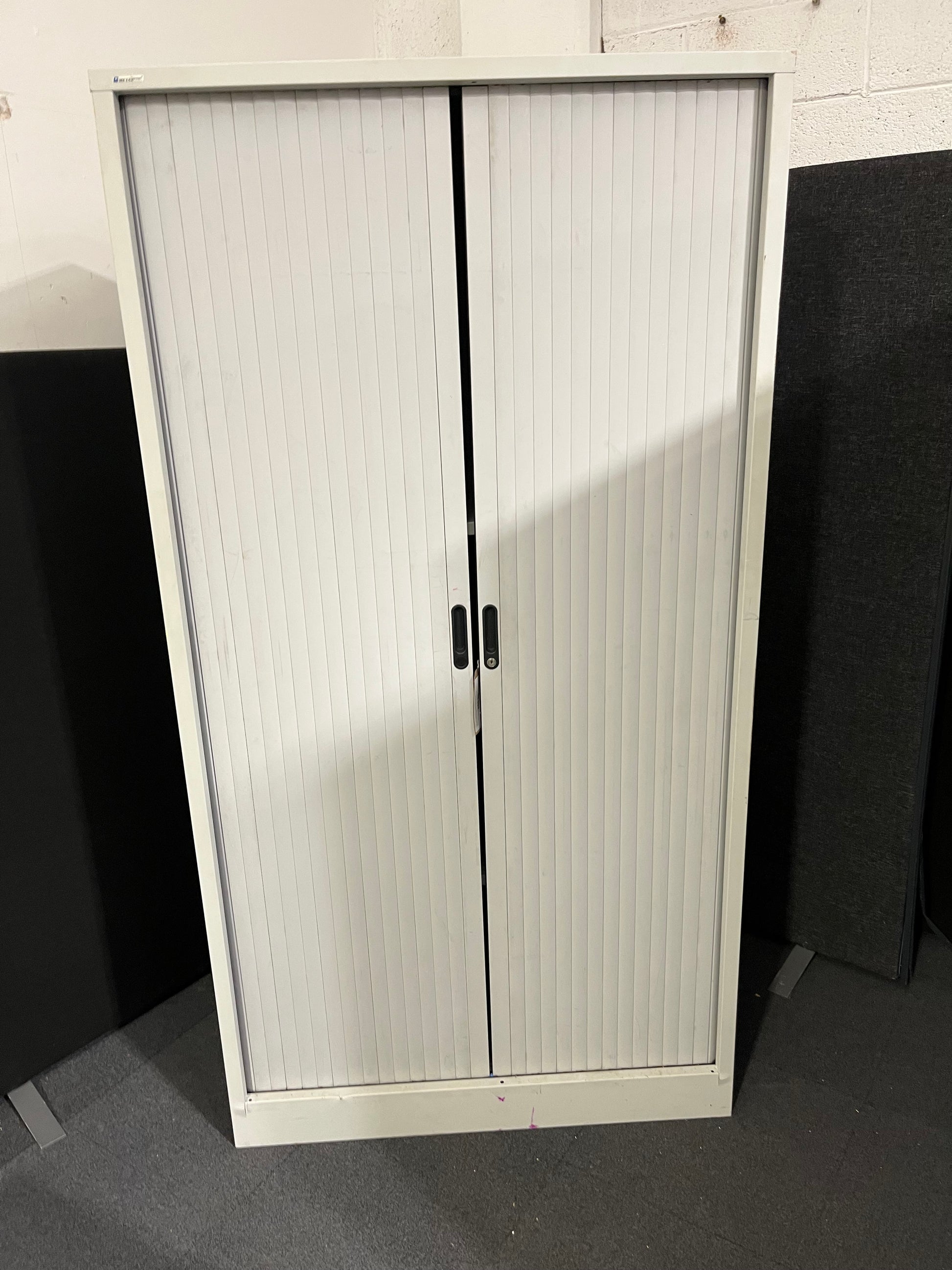 Tall 2 door sideopen metal tambour unit, grey metal frame with grey plastic sliding doors with internal shelves 190Hx100x450D 1425