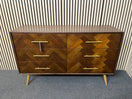 Mid-century style wooden chest with chevron pattern and brass handles. (H 86 x W 135 x D 42 cm)  44574