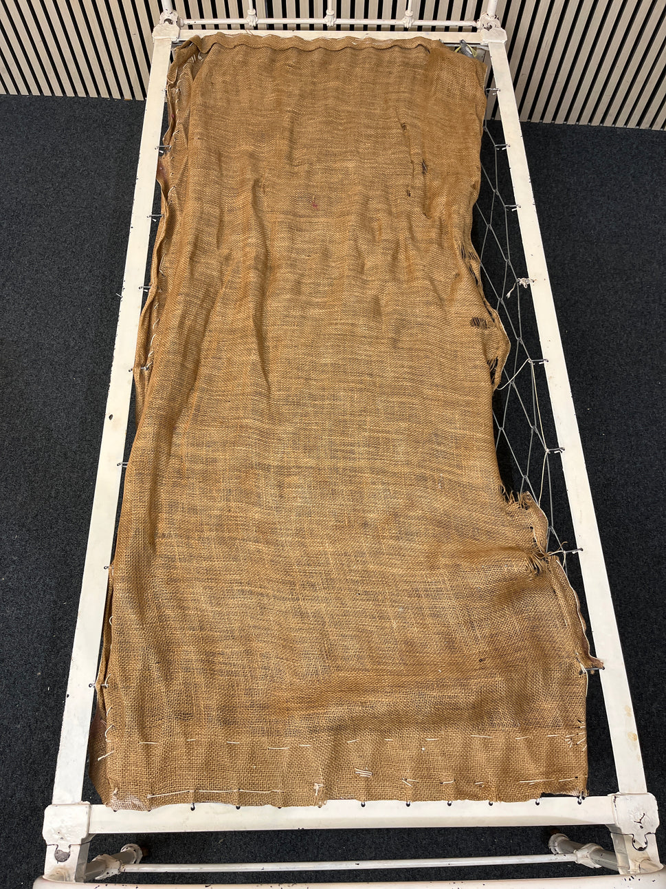 Antique white metal day bed on castors 1126