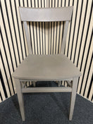 Simple minimalist wooden dining chair finished in a matte gray.  44551