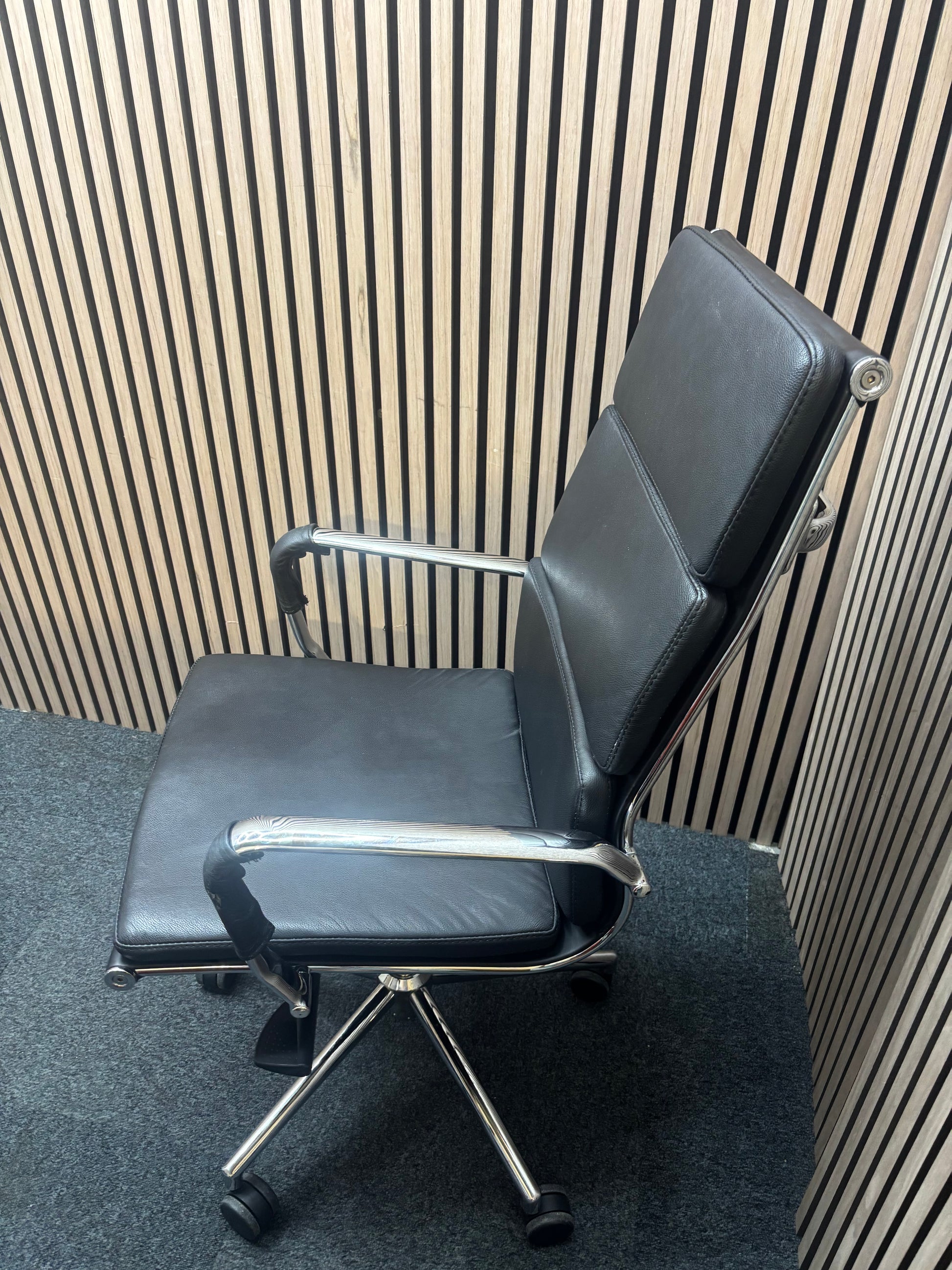 High back real black leather Eames style tall executive height adjustable swivel chair with polished chrome arms and base  J3912