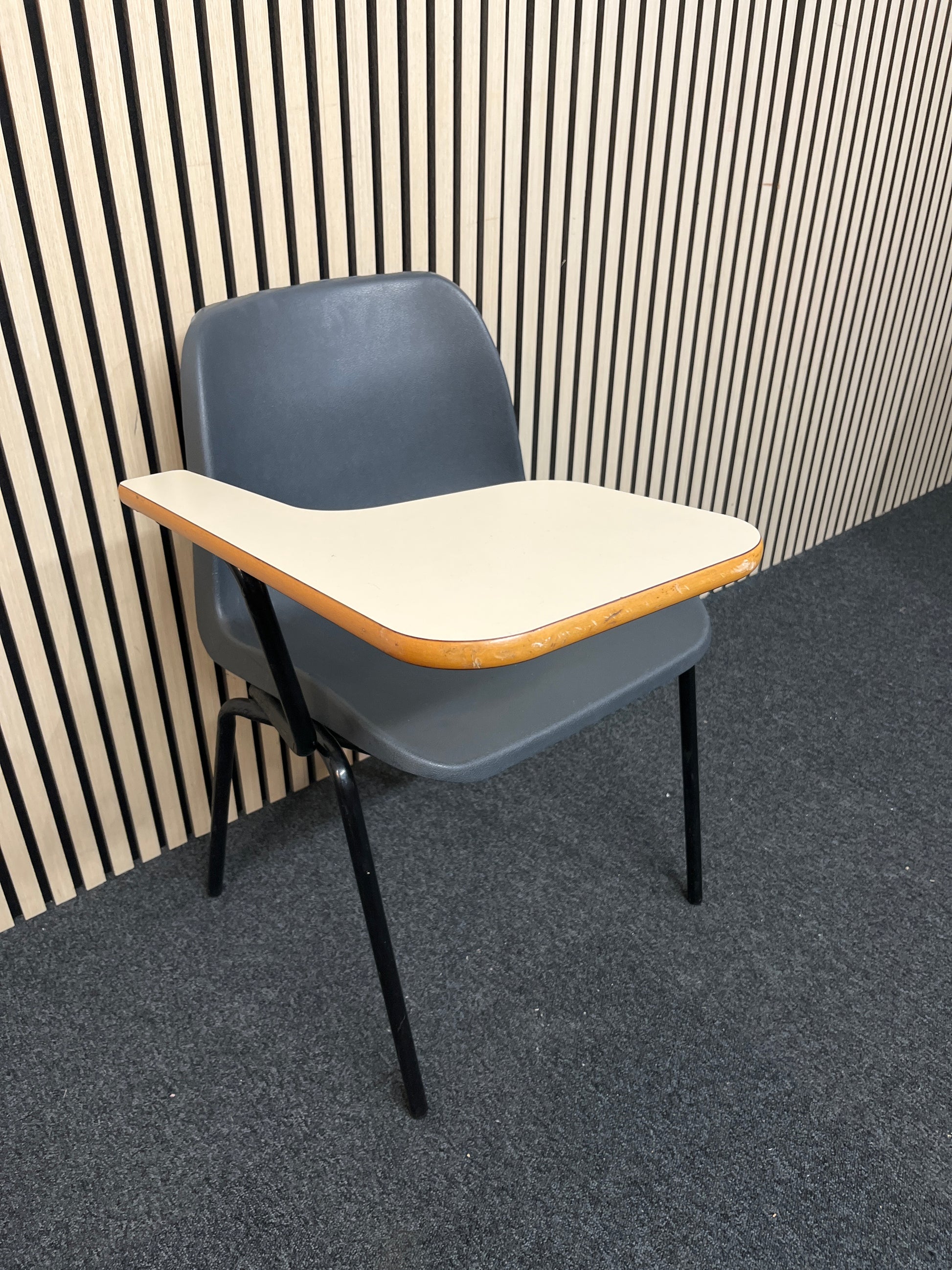 Polyprop stacking chair, black metal frame with wooden writing tablet 1425