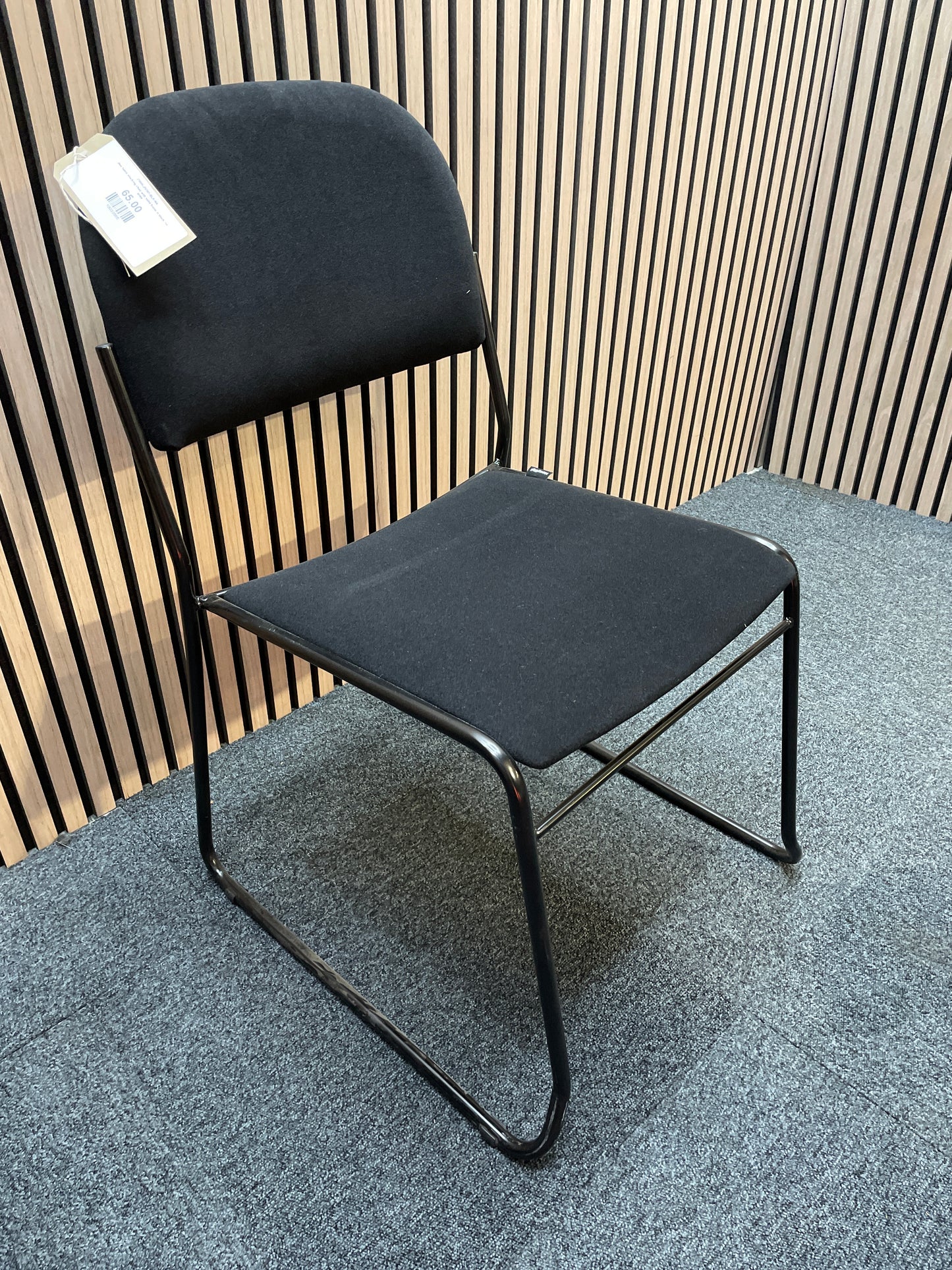 Jive fabric stacking chair with solid frame in black- no arms